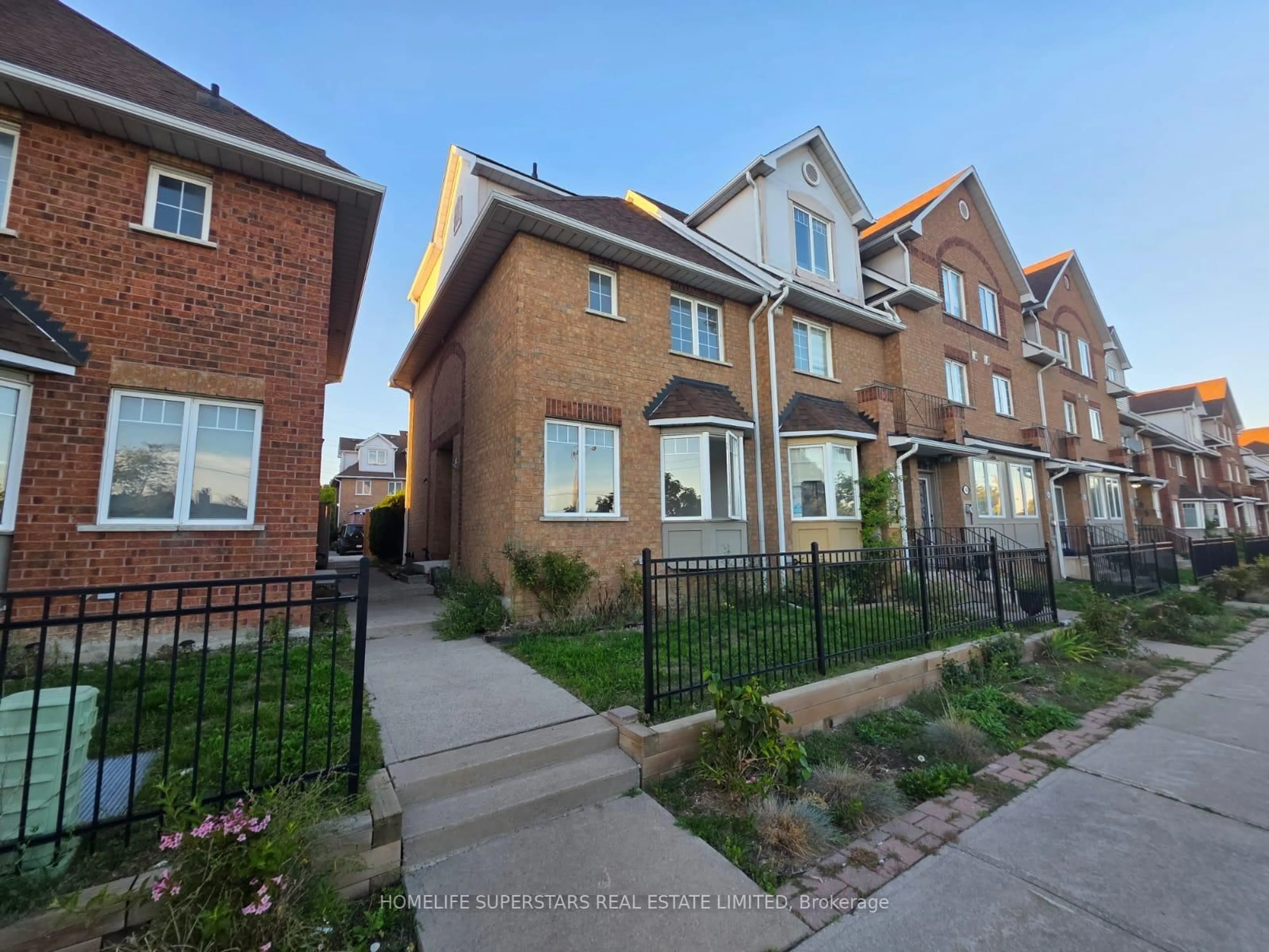 A pic from outside/outdoor area/front of a property/back of a property/a pic from drone, street for 9480 Sheppard Ave #74, Toronto Ontario M1B 5Z4