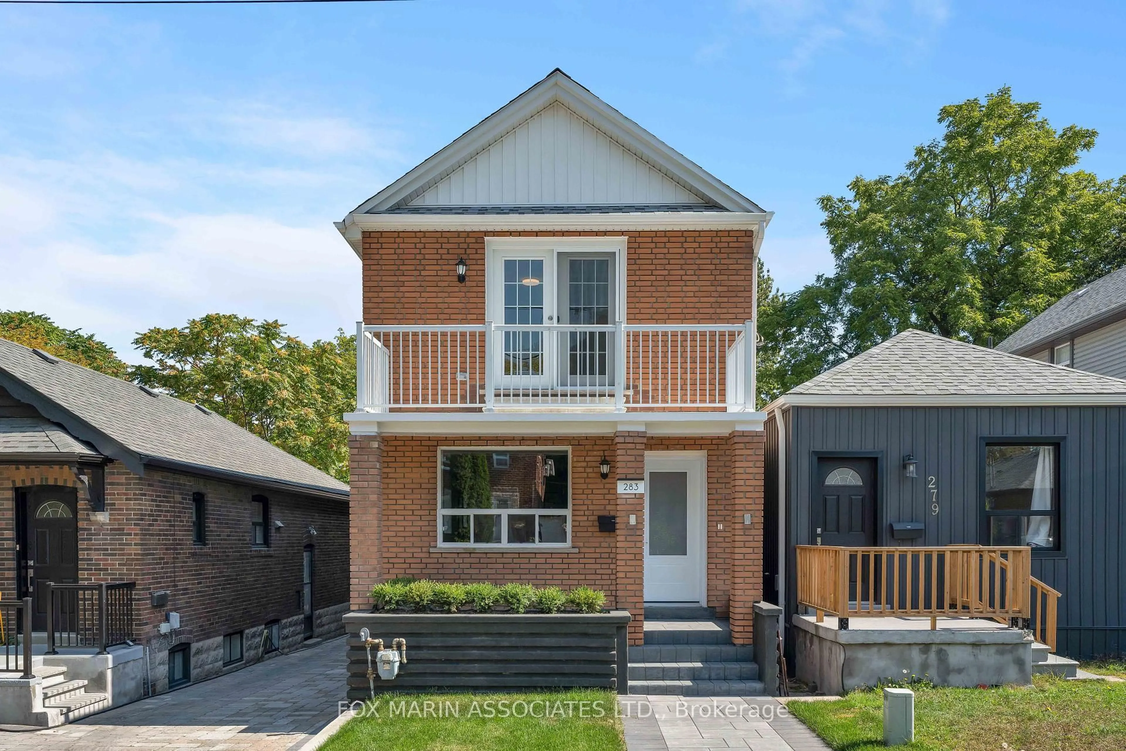 Home with brick exterior material, street for 283 Cedarvale Ave, Toronto Ontario M4C 4K3