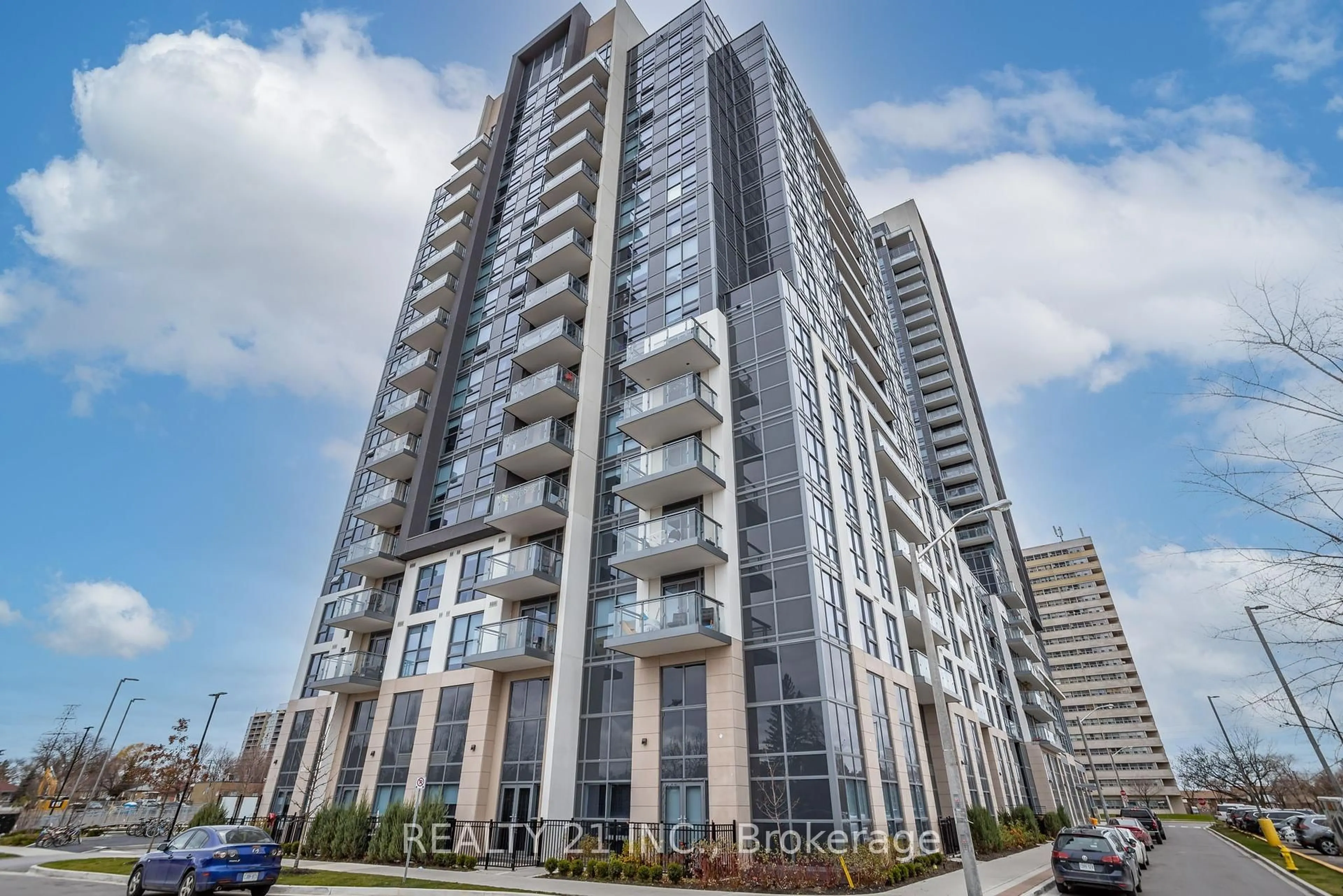 A pic from outside/outdoor area/front of a property/back of a property/a pic from drone, building for 30 Meadowglen Pl #519, Toronto Ontario M1G 0A6