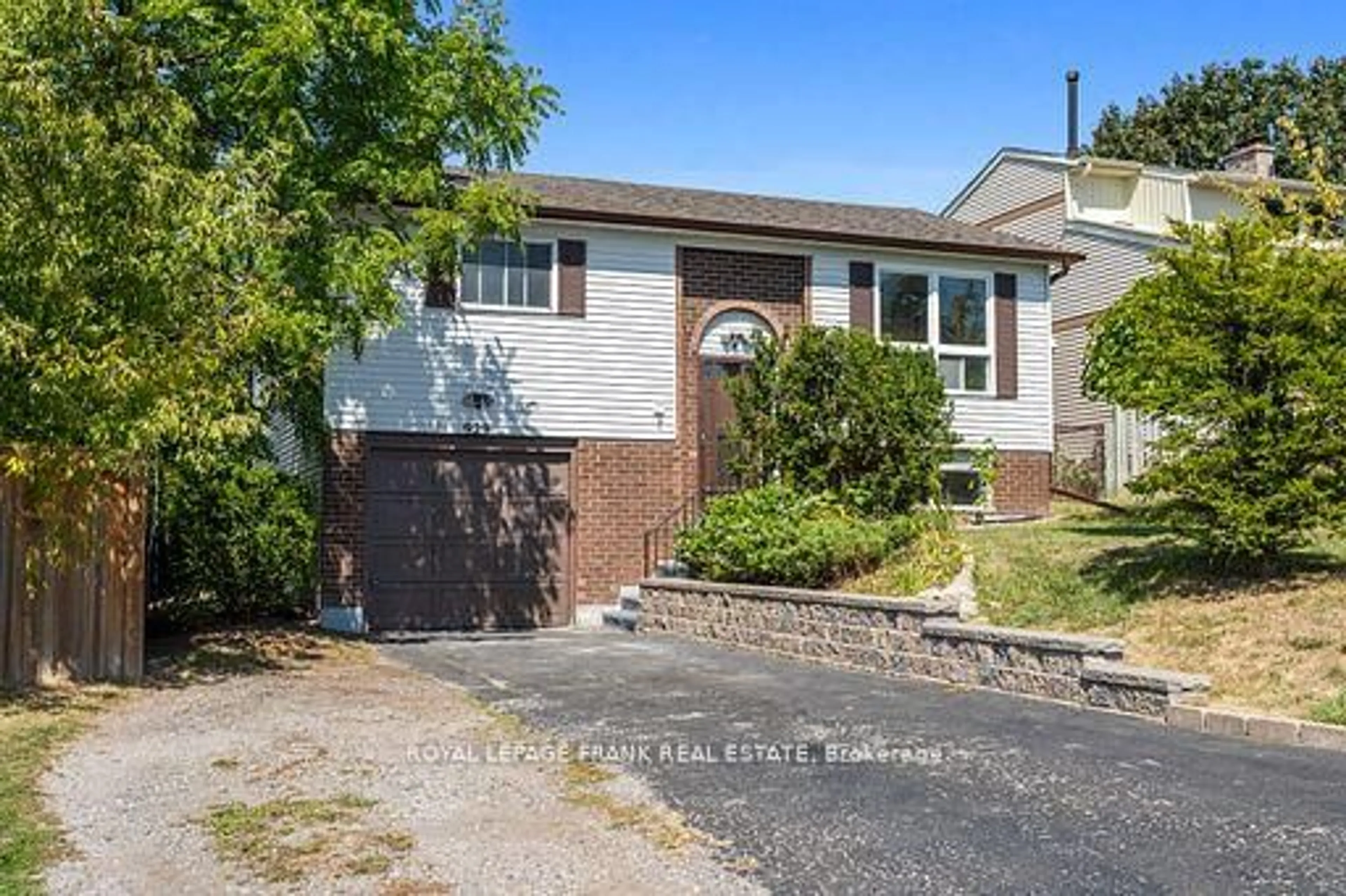 Home with brick exterior material, street for 929 Southdown Dr, Oshawa Ontario L1H 7Z5
