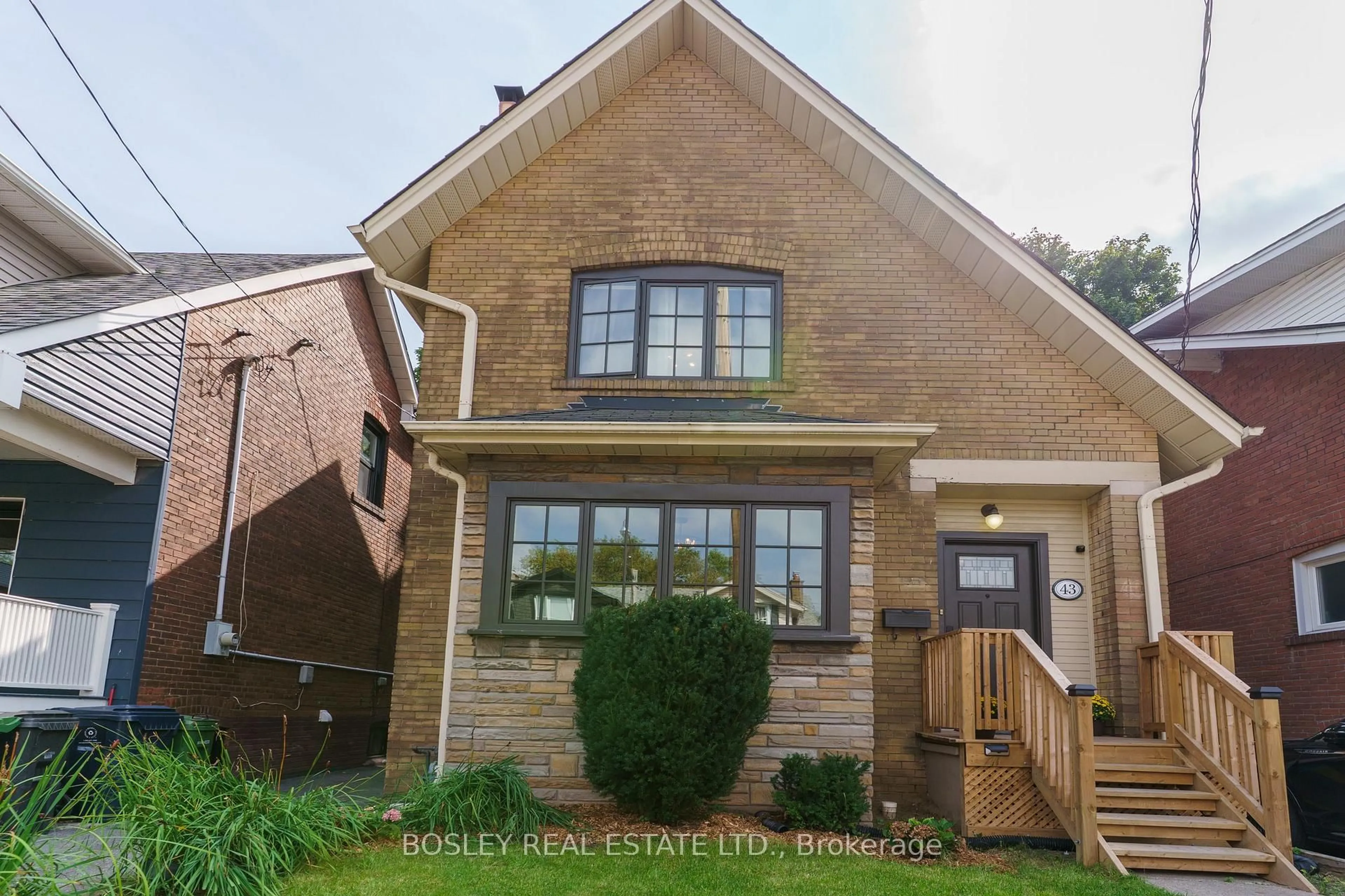 Home with brick exterior material, street for 43 Eastwood Rd, Toronto Ontario M4L 2C6