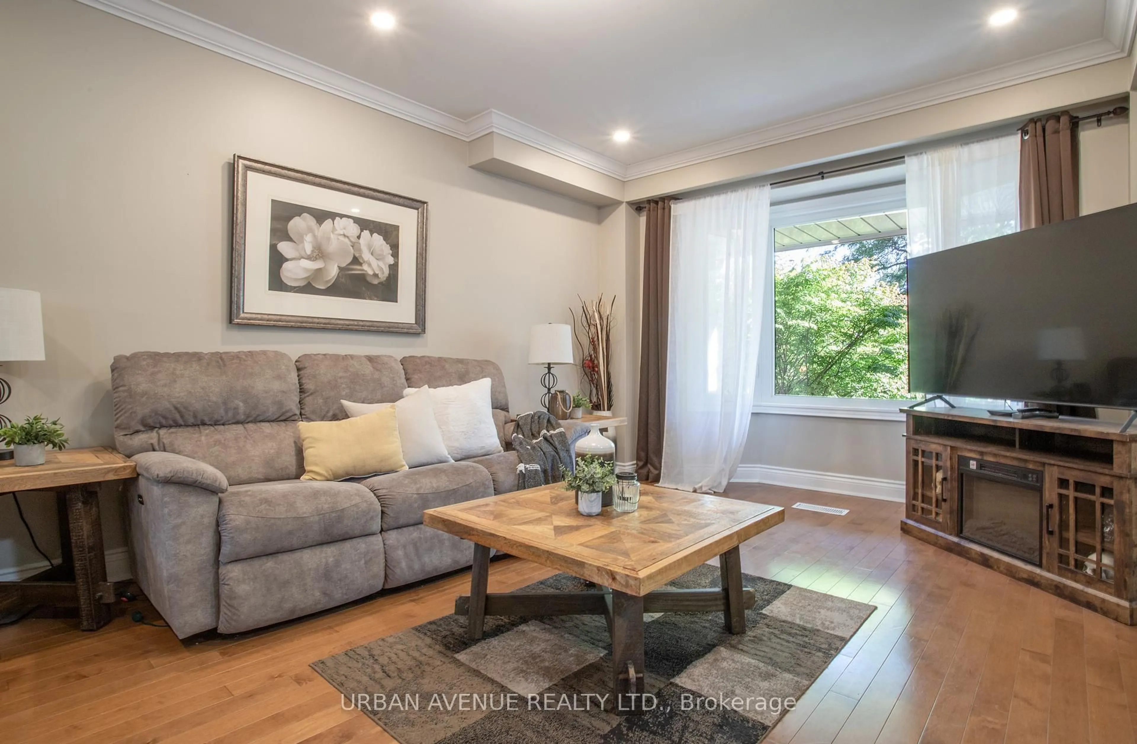 Living room with furniture, wood/laminate floor for 1903 New St, Pickering Ontario L1V 3J8