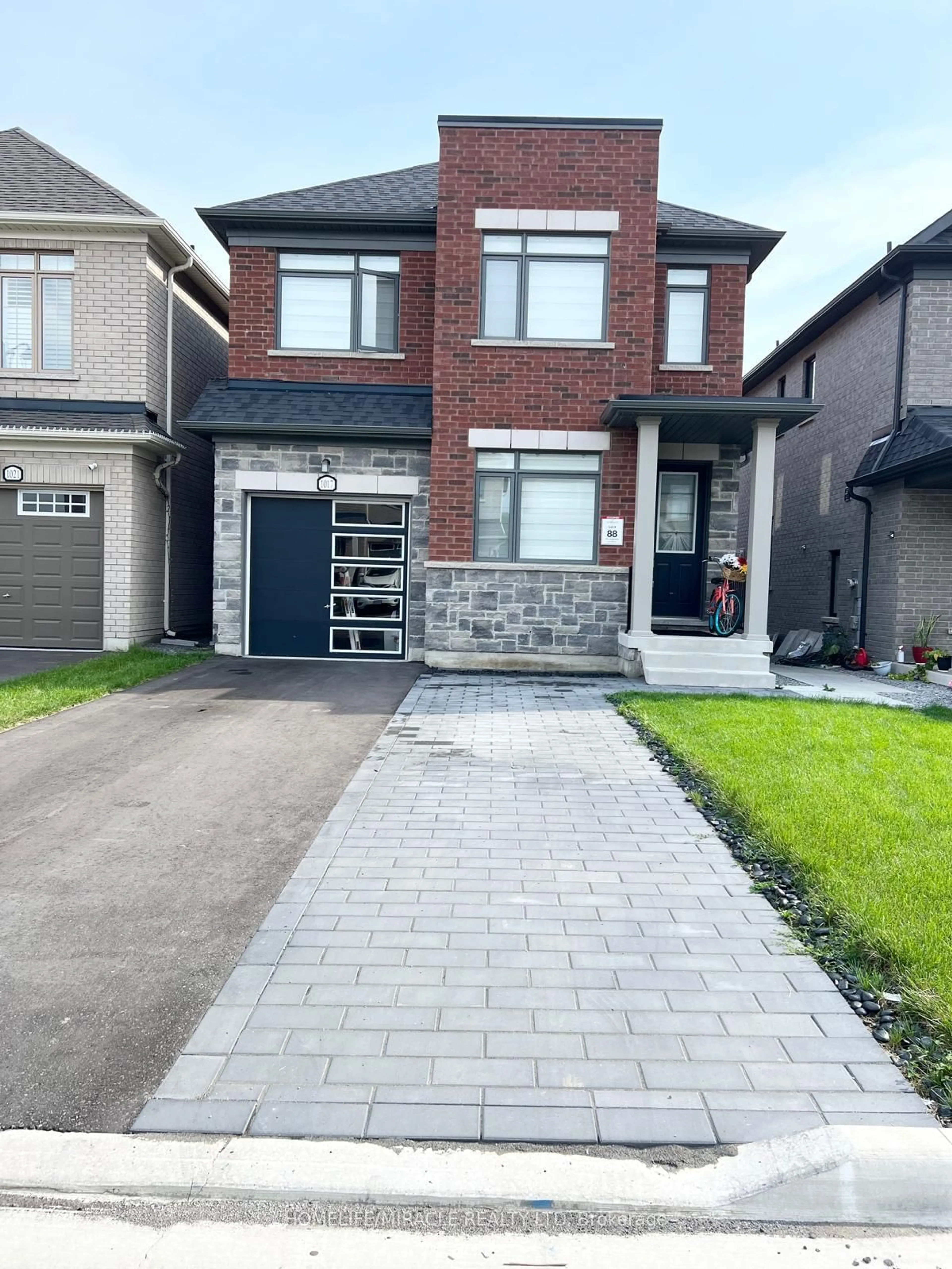 Home with brick exterior material, street for 1017 Lockie Dr, Oshawa Ontario L1L 0S2