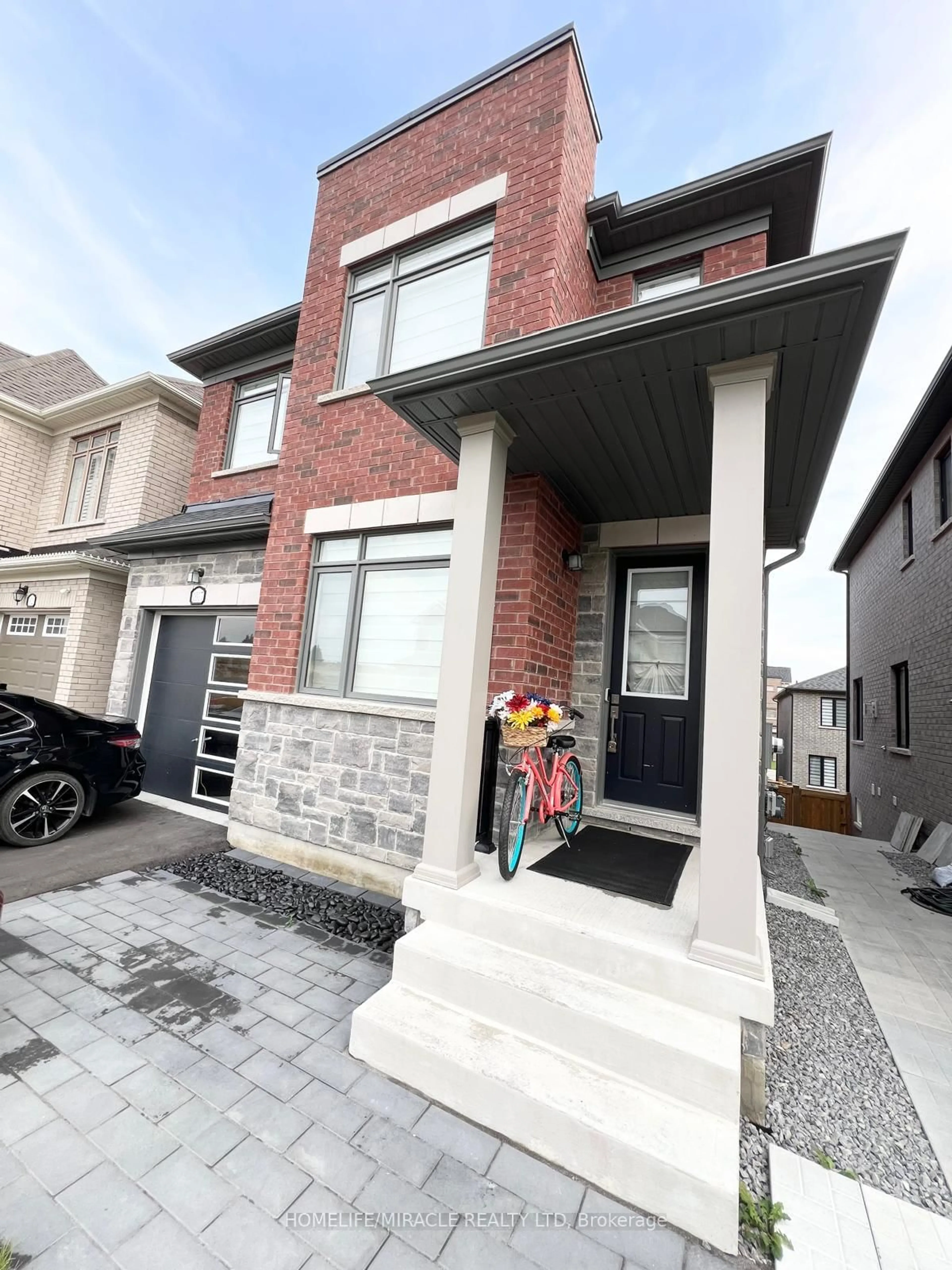 Home with brick exterior material, street for 1017 Lockie Dr, Oshawa Ontario L1L 0S2