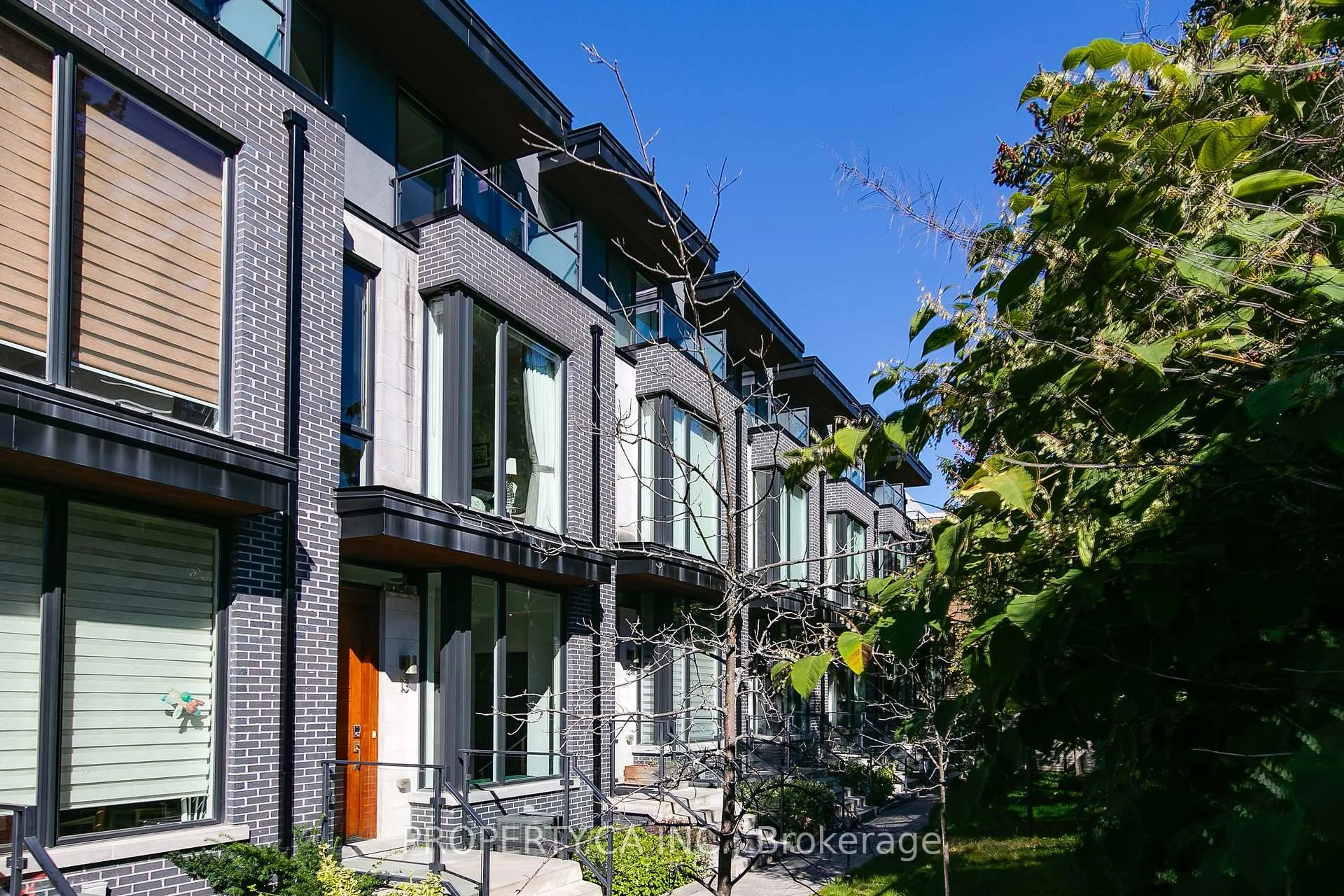 Home with brick exterior material, street for 837 Broadview Ave #13, Toronto Ontario M4K 2P9
