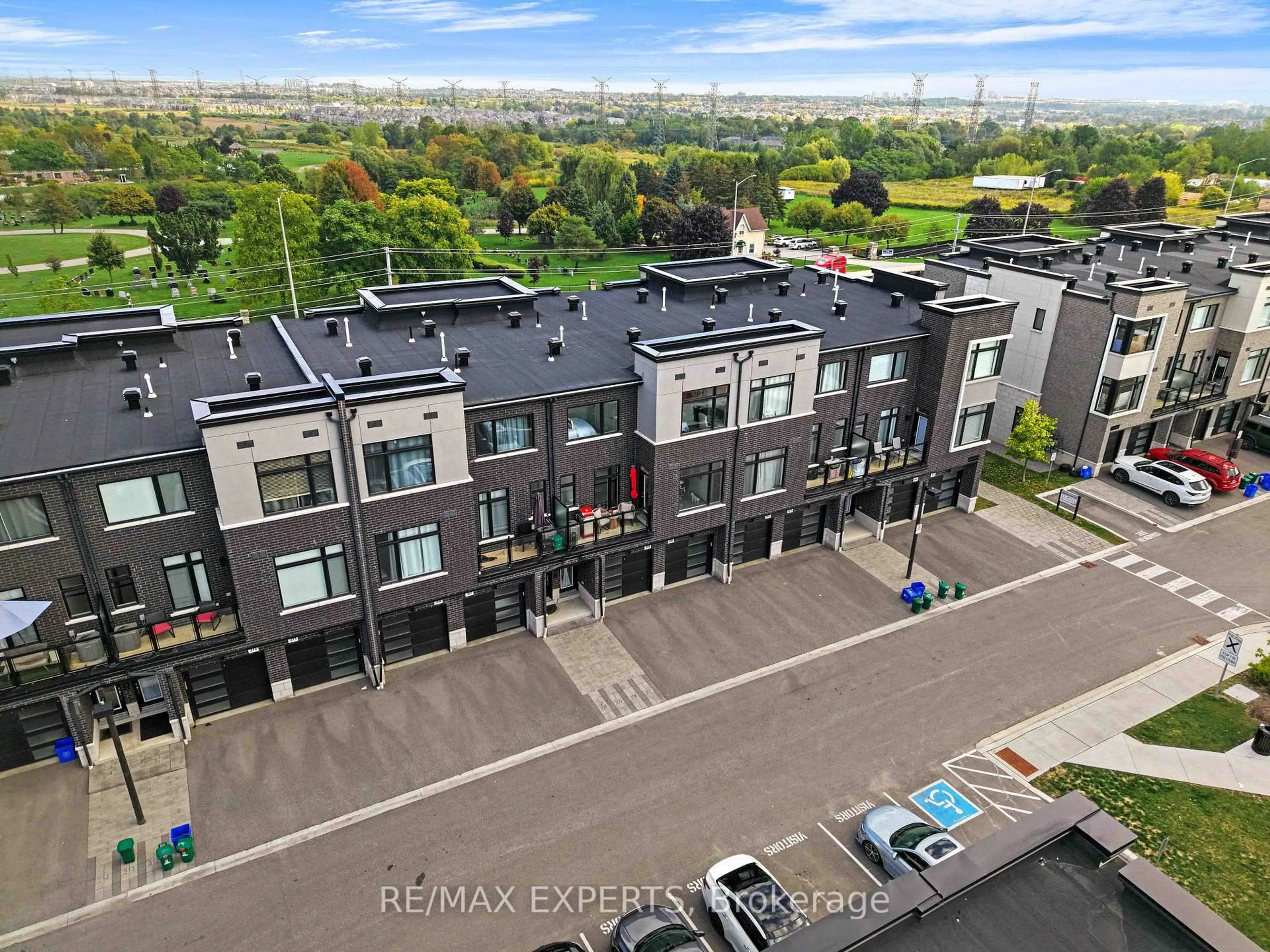 A pic from outside/outdoor area/front of a property/back of a property/a pic from drone, city buildings view from balcony for 2550 Castlegate Crossing #309, Pickering Ontario L1X 0G4
