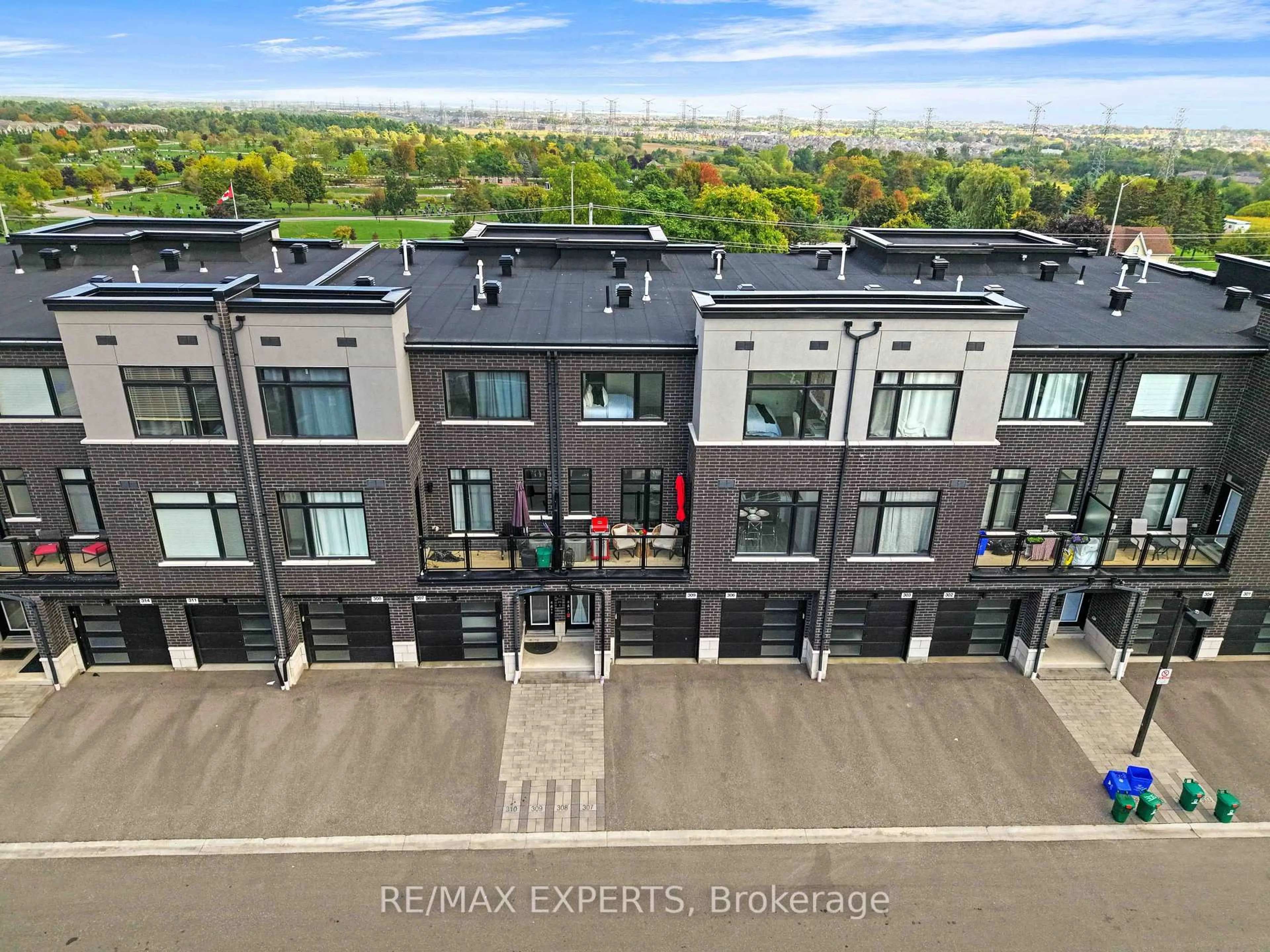 A pic from outside/outdoor area/front of a property/back of a property/a pic from drone, city buildings view from balcony for 2550 Castlegate Crossing #309, Pickering Ontario L1X 0G4