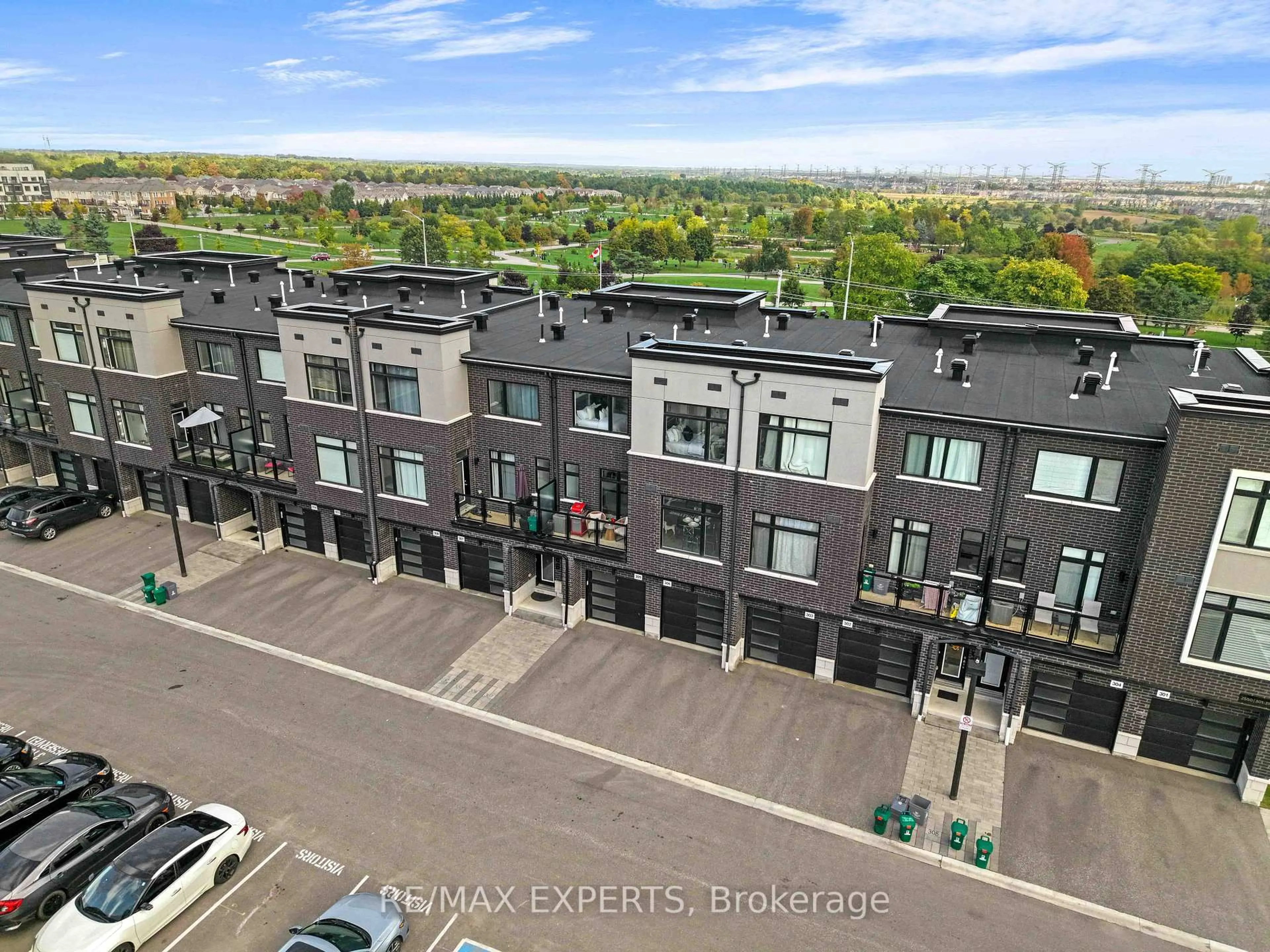 A pic from outside/outdoor area/front of a property/back of a property/a pic from drone, city buildings view from balcony for 2550 Castlegate Crossing #309, Pickering Ontario L1X 0G4