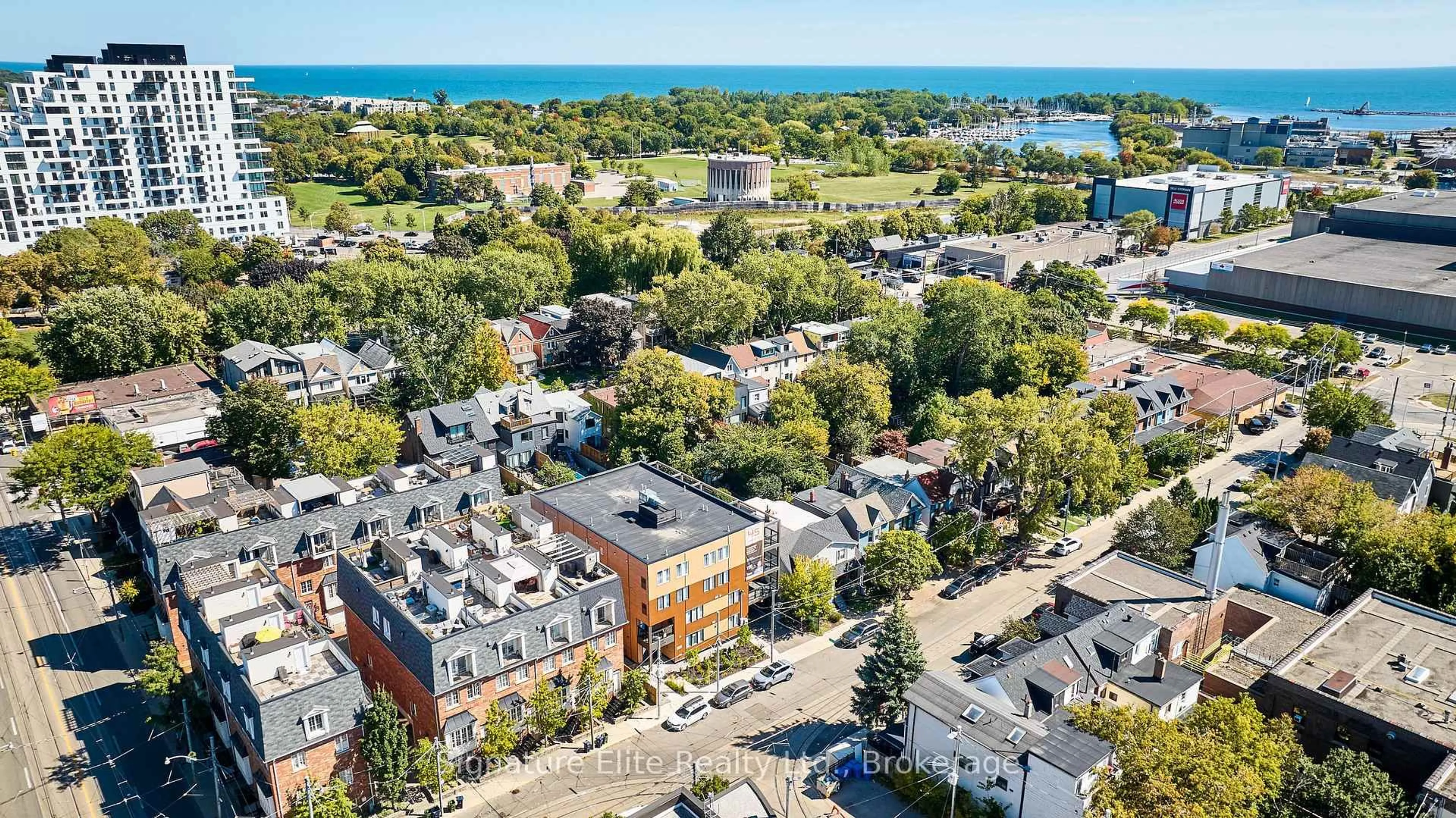 A pic from outside/outdoor area/front of a property/back of a property/a pic from drone, city buildings view from balcony for 45 Connaught Ave #103, Toronto Ontario M4L 2V8