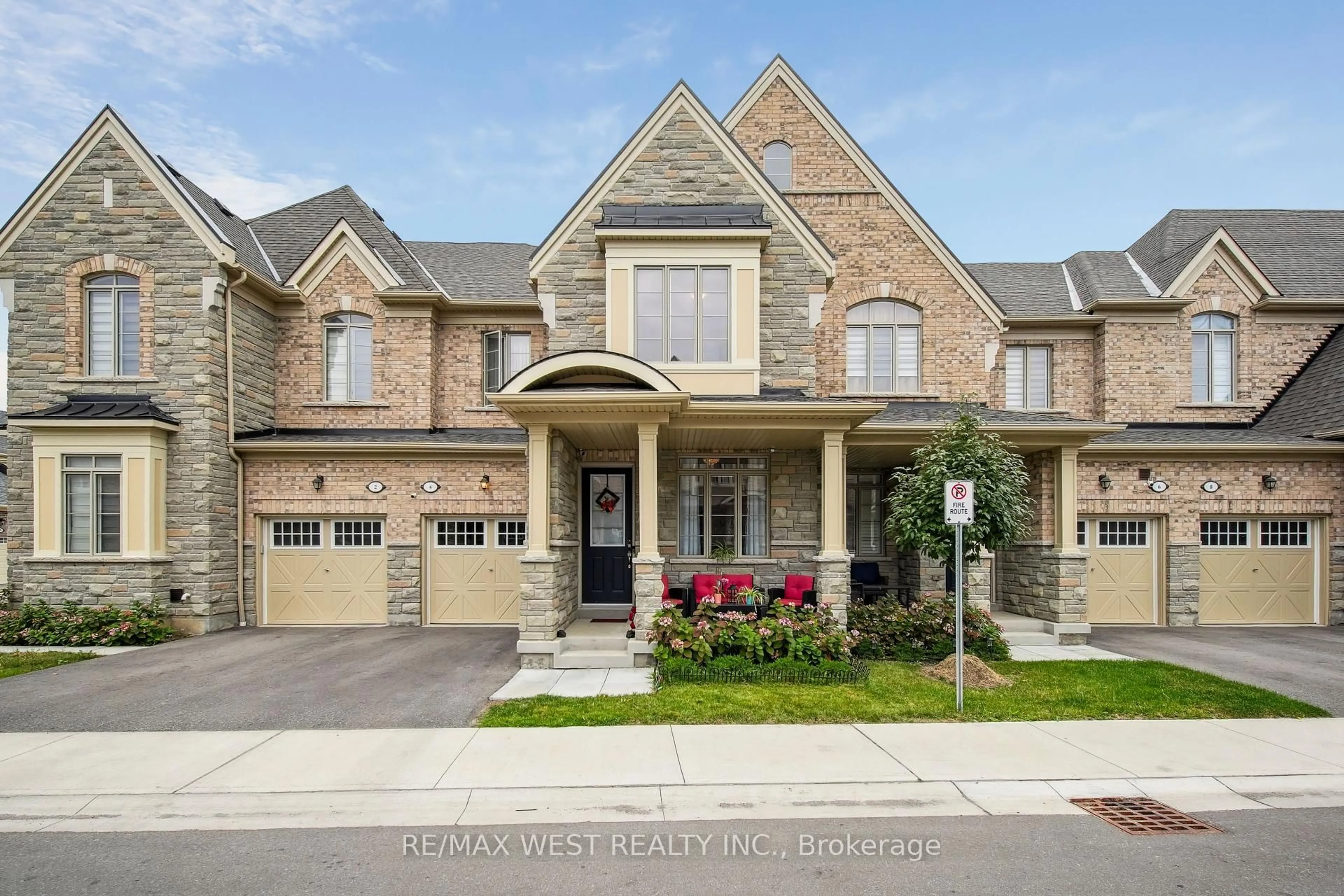Home with brick exterior material, street for 4 Hickling Lane, Ajax Ontario L1T 0N6