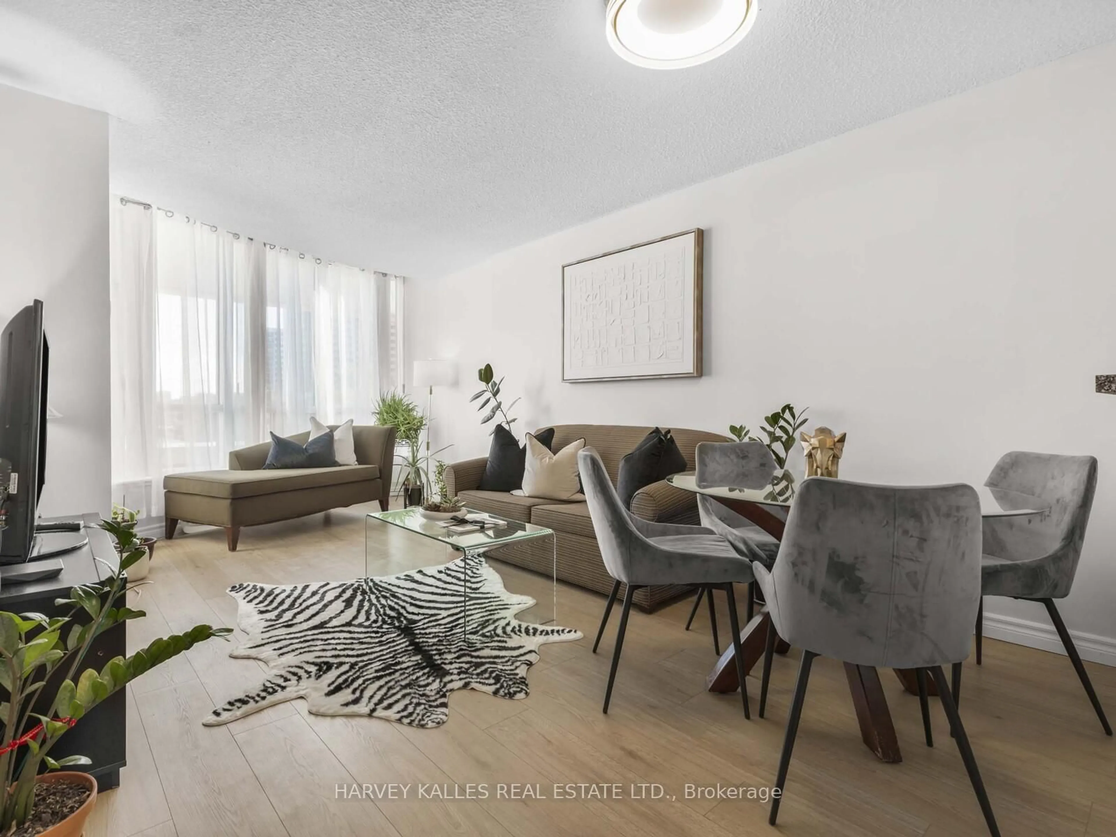 Living room with furniture, unknown for 2550 Lawrence Ave #211, Toronto Ontario M1P 4Z3