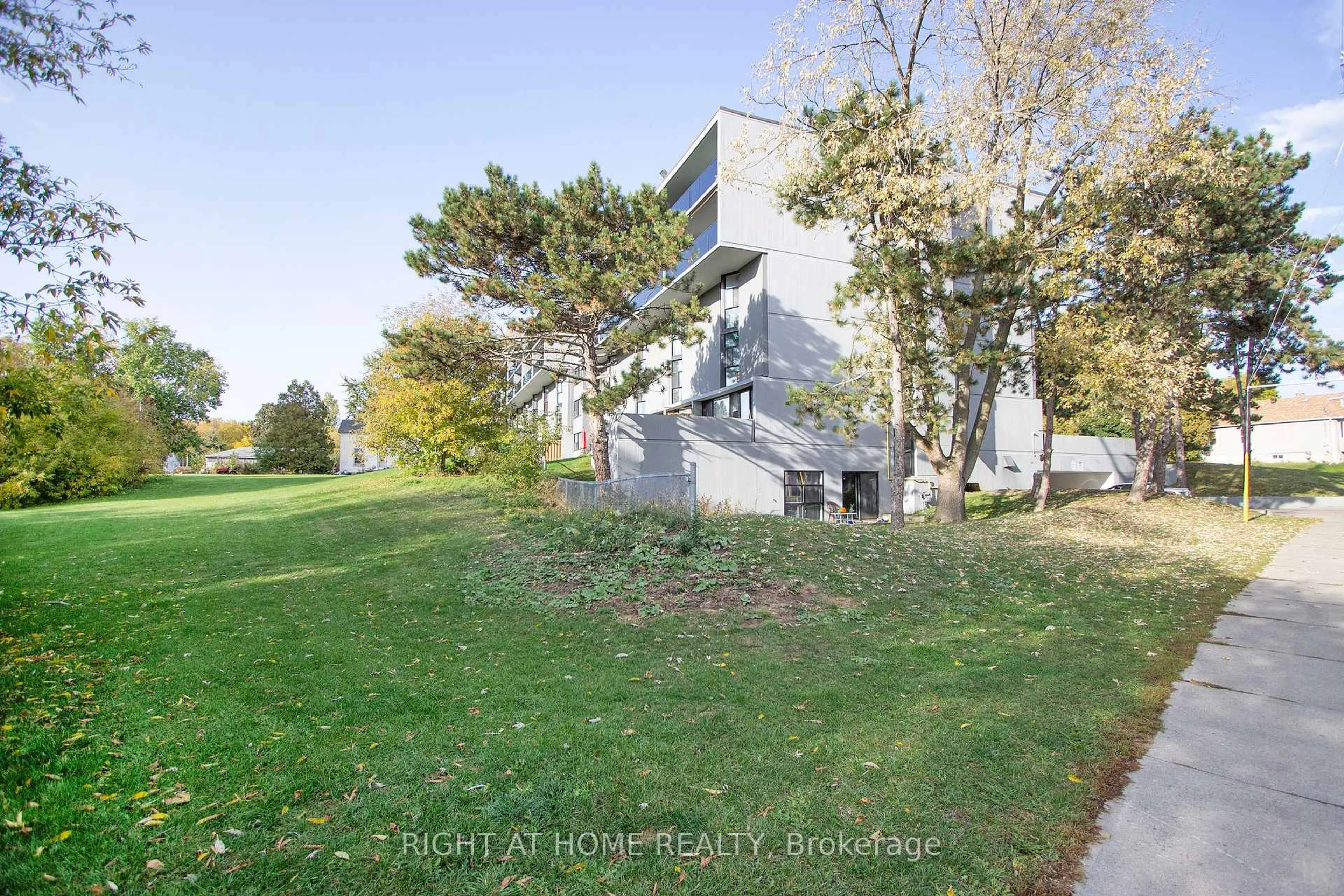 A pic from outside/outdoor area/front of a property/back of a property/a pic from drone, unknown for 454 Centre St #110, Oshawa Ontario L1H 4C2