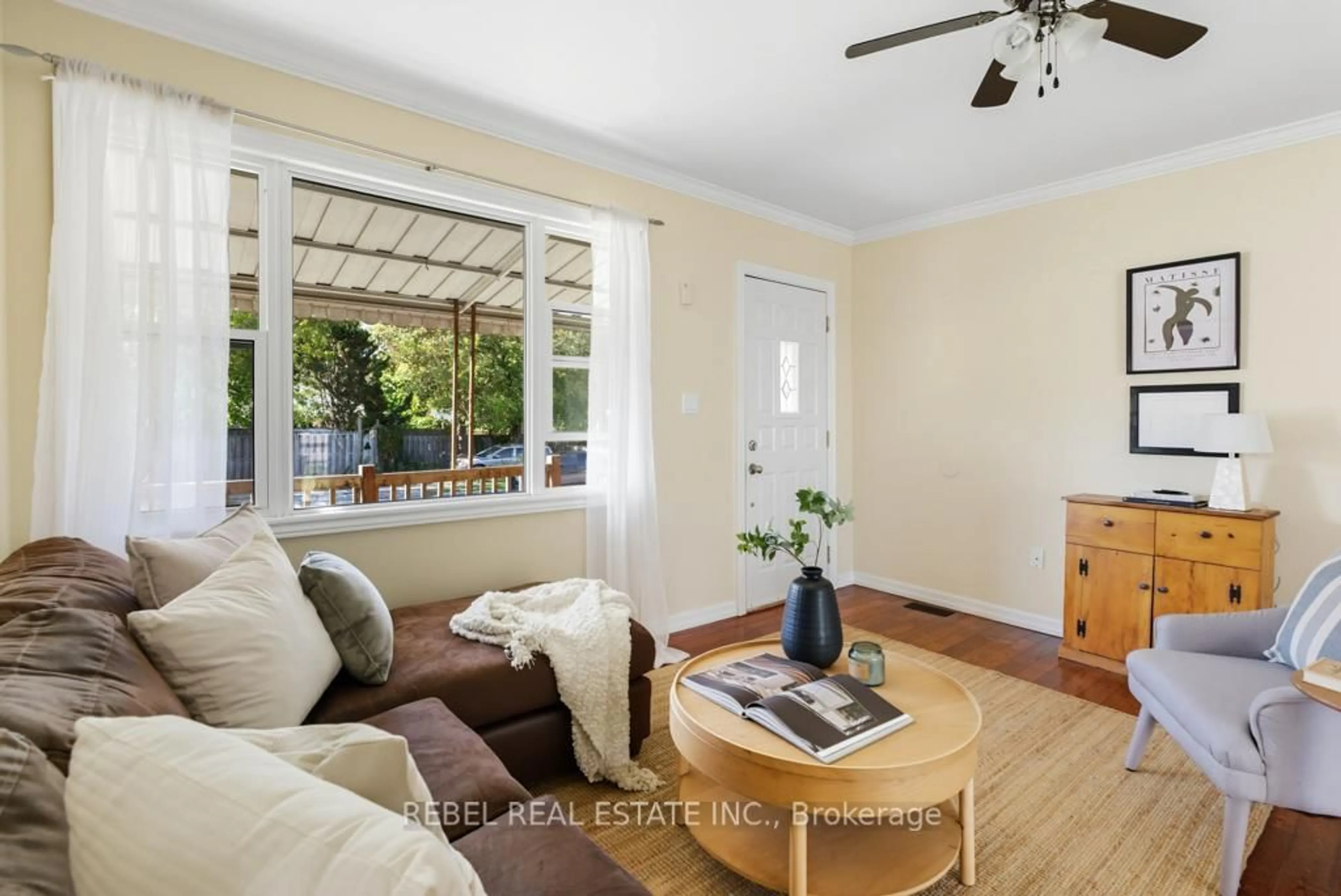 Living room with furniture, wood/laminate floor for 765 Rowena St, Oshawa Ontario L1H 4Z3