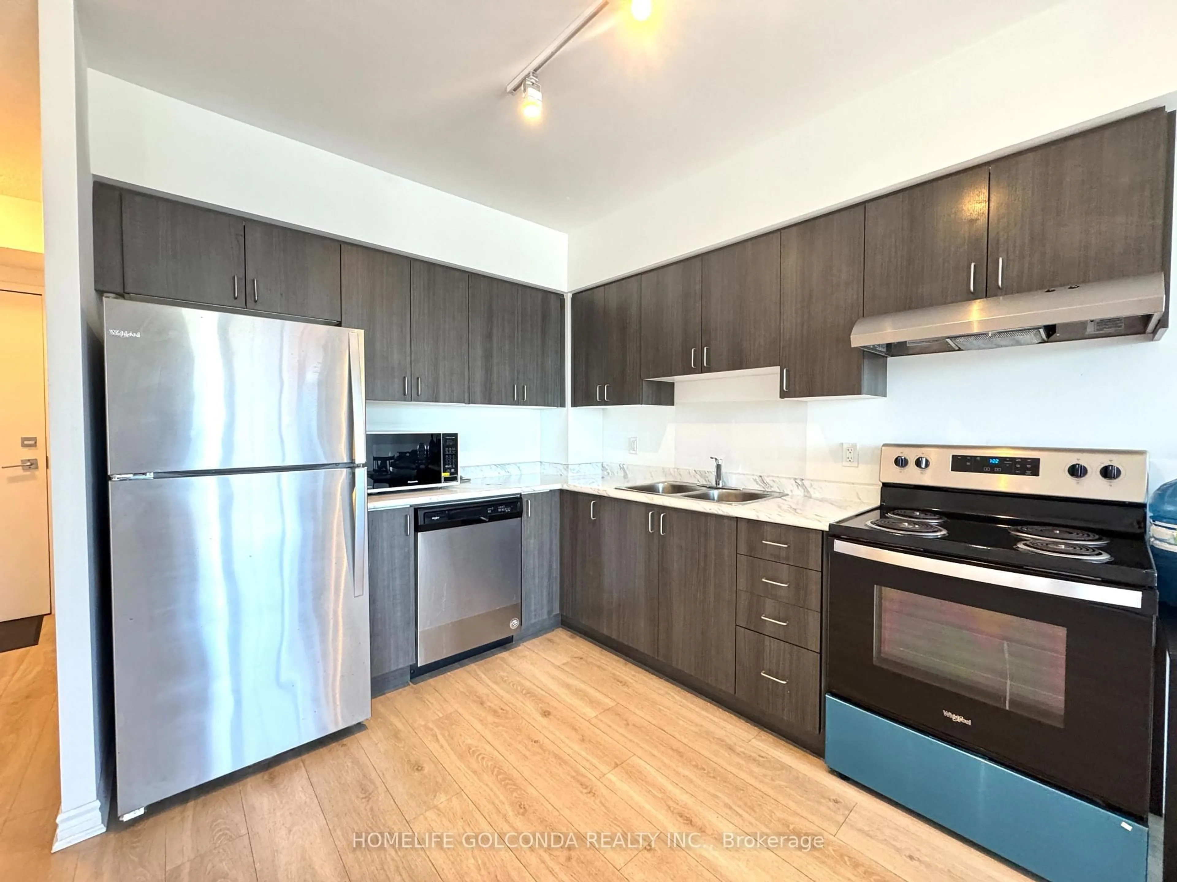 Standard kitchen, wood/laminate floor for 1 Falaise Rd #619, Toronto Ontario M1E 0B9