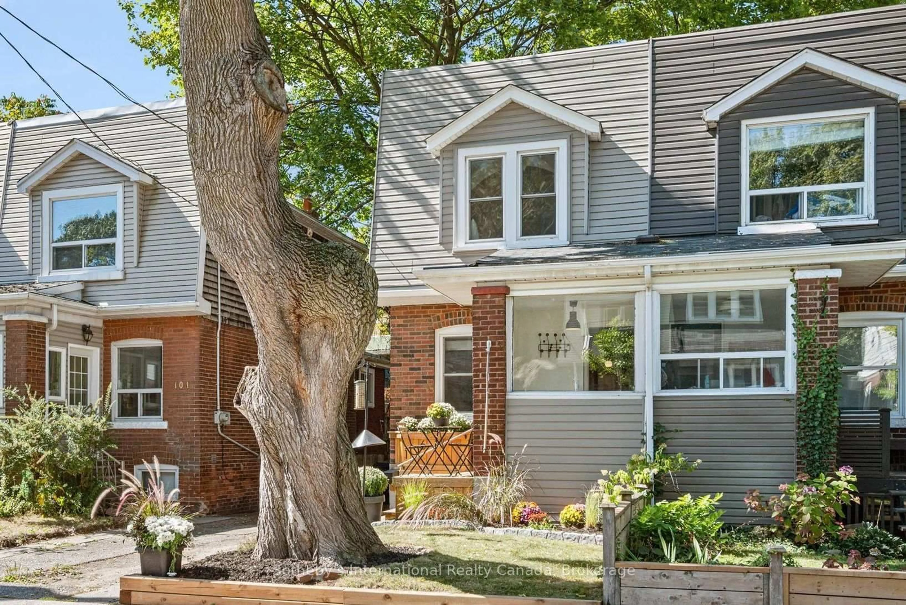 Home with brick exterior material, street for 106 Hiltz Ave, Toronto Ontario M4L 2N5