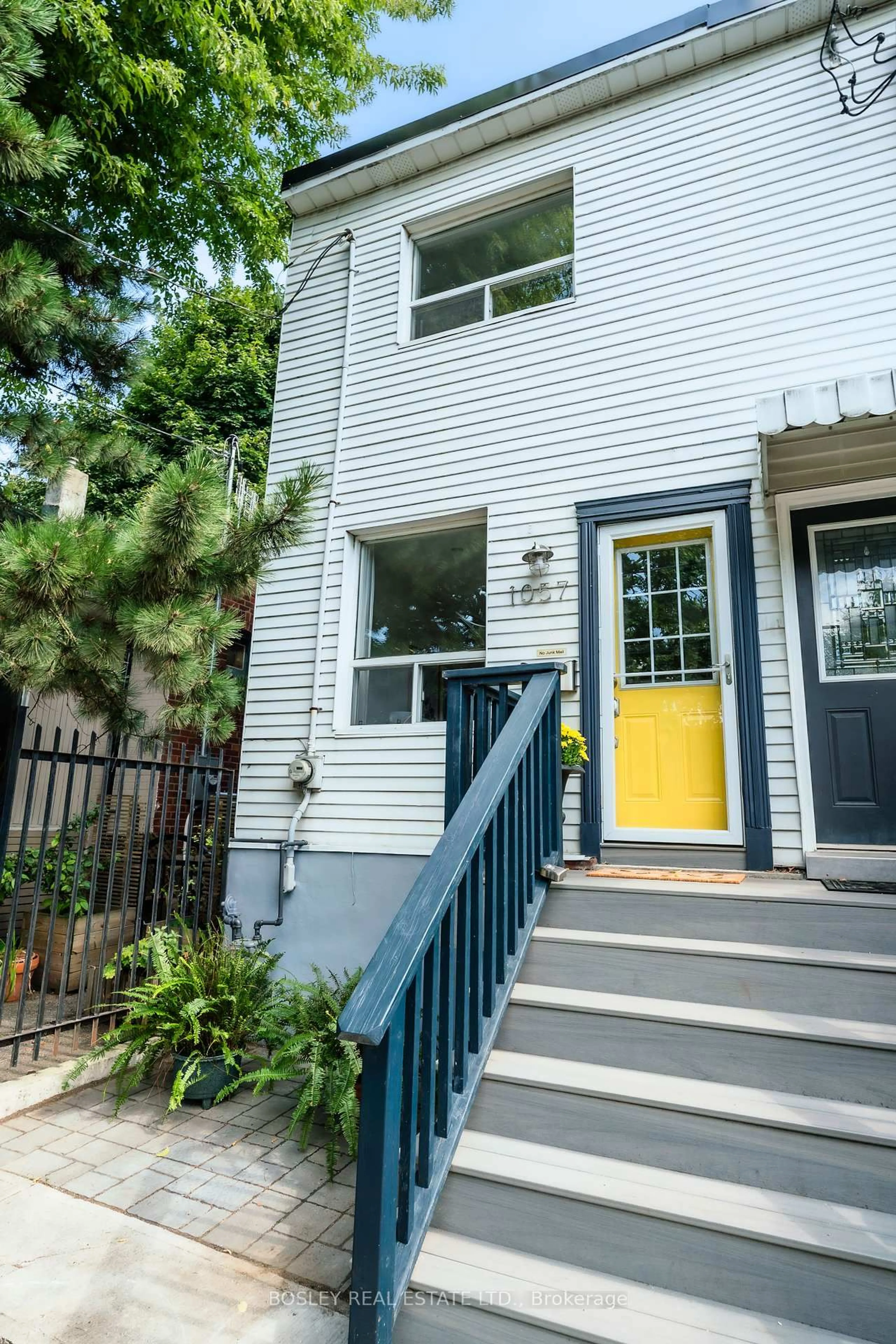 Home with vinyl exterior material, street for 1057 Craven Rd, Toronto Ontario M4J 4V7