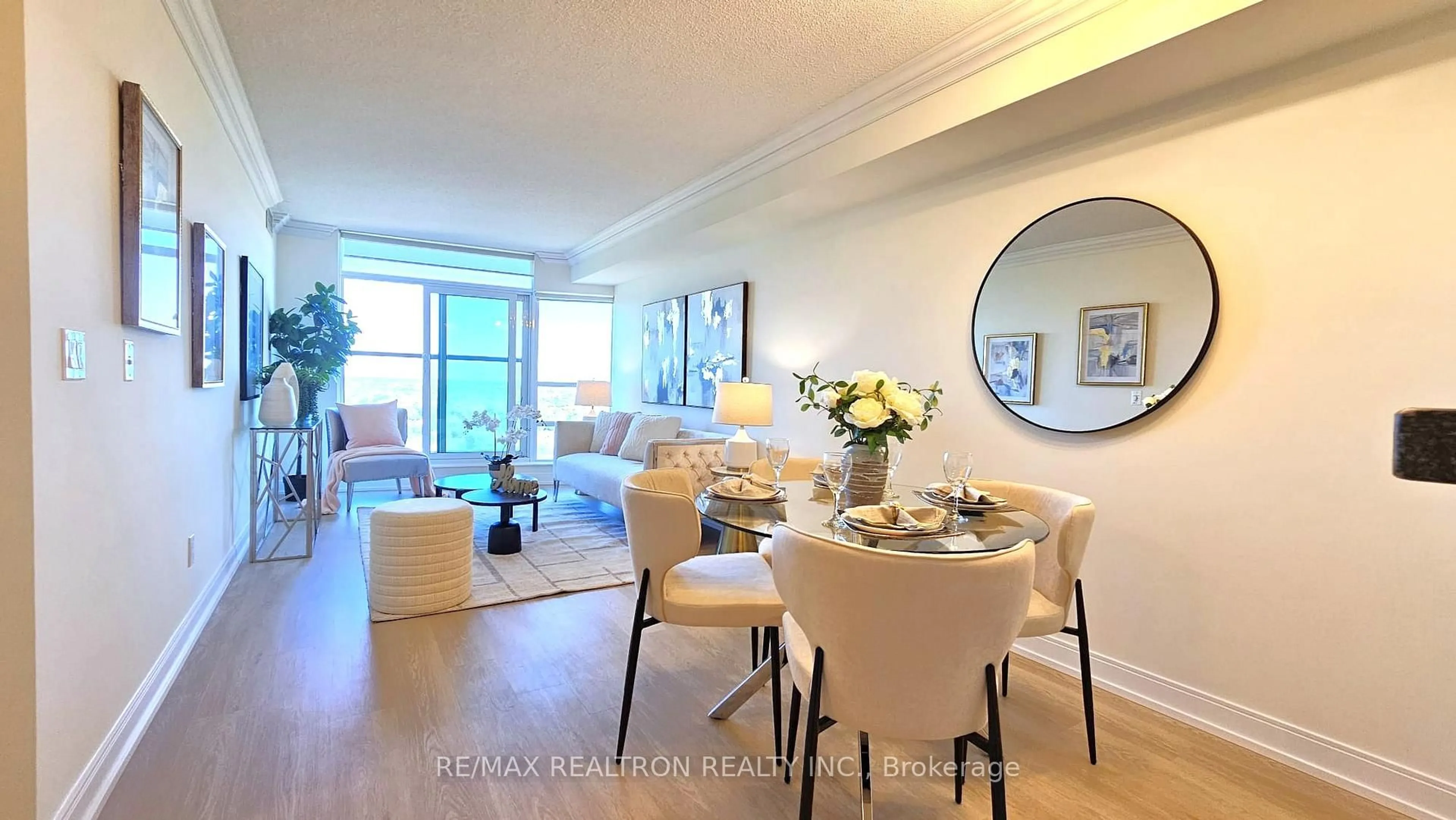 Living room with furniture, wood/laminate floor for 238 Bonis Ave #2615, Toronto Ontario M1T 3W7