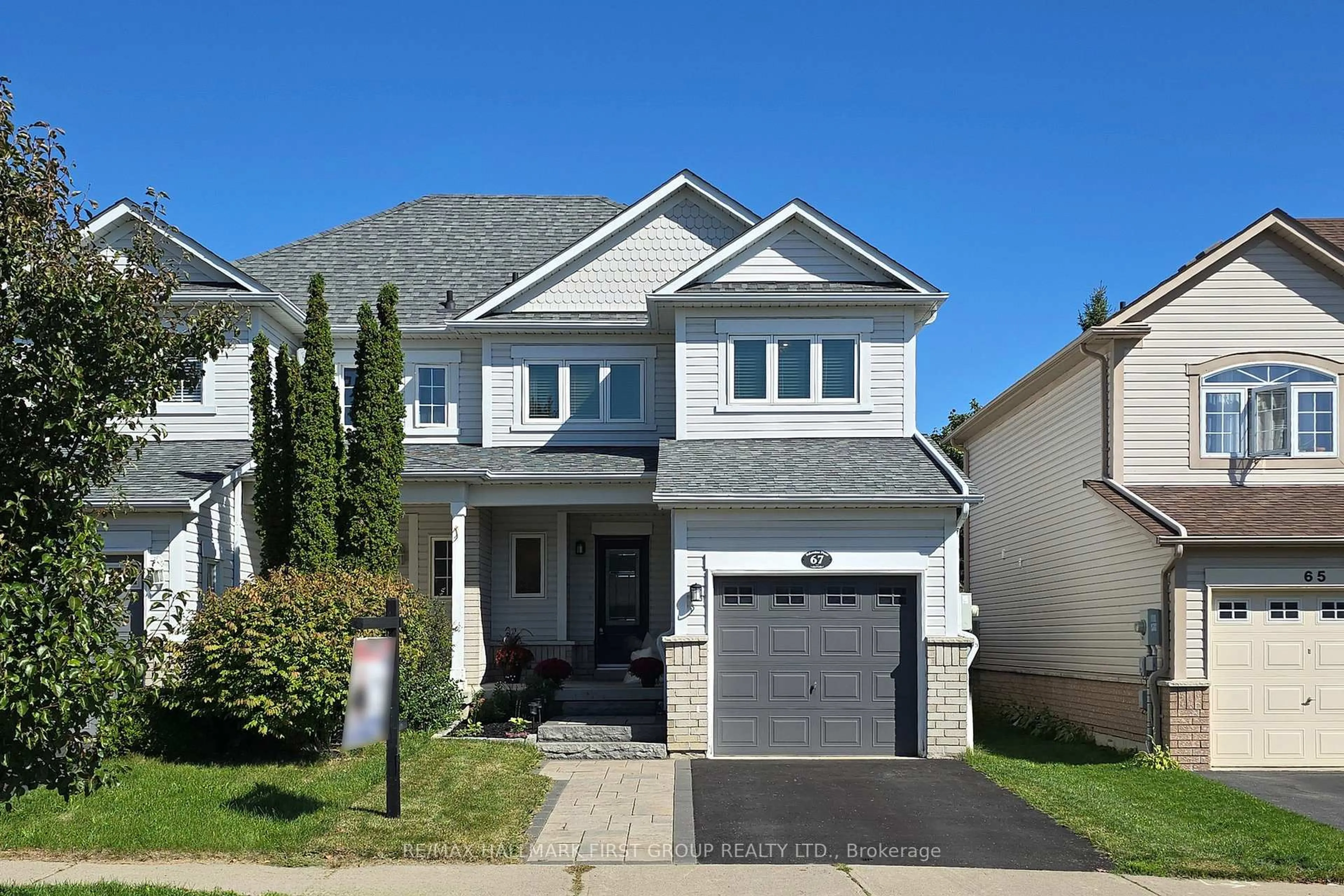 Home with vinyl exterior material, street for 67 Palomino Pl, Whitby Ontario L1R 2V5