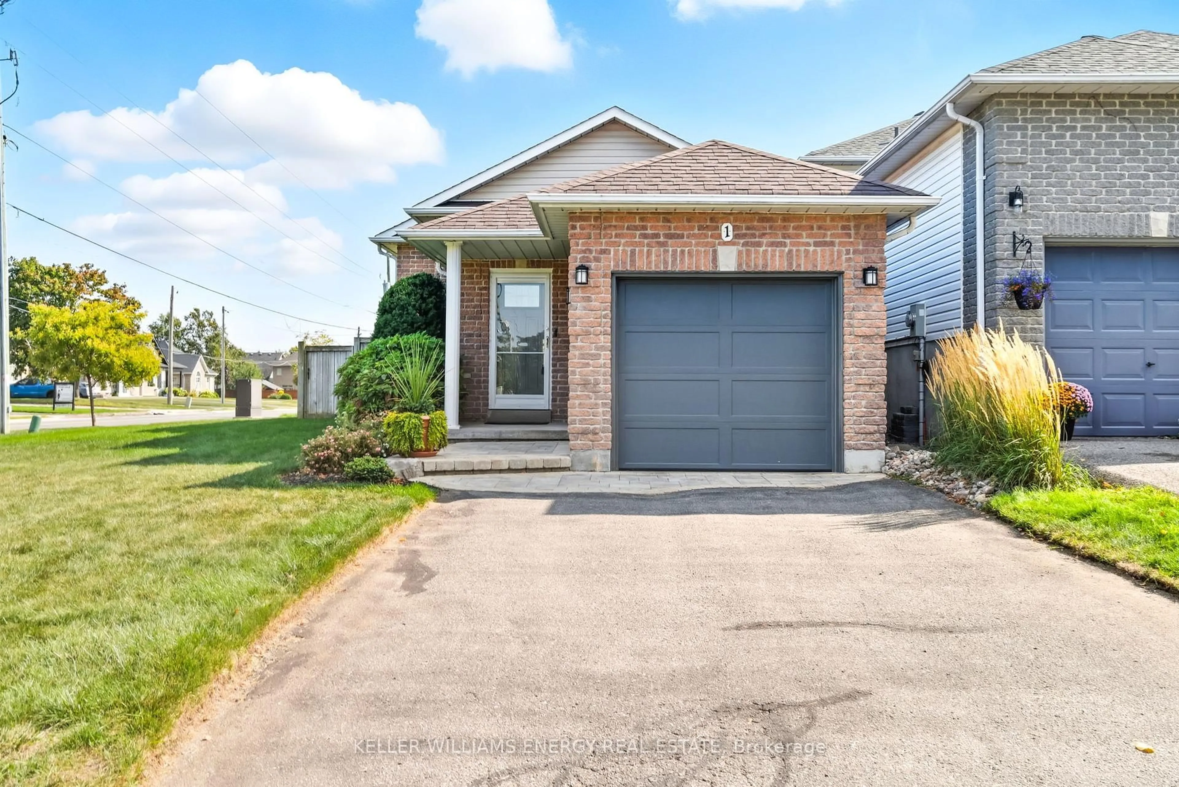 Home with brick exterior material, street for 1 Daiseyfield Ave, Clarington Ontario L1E 3E8