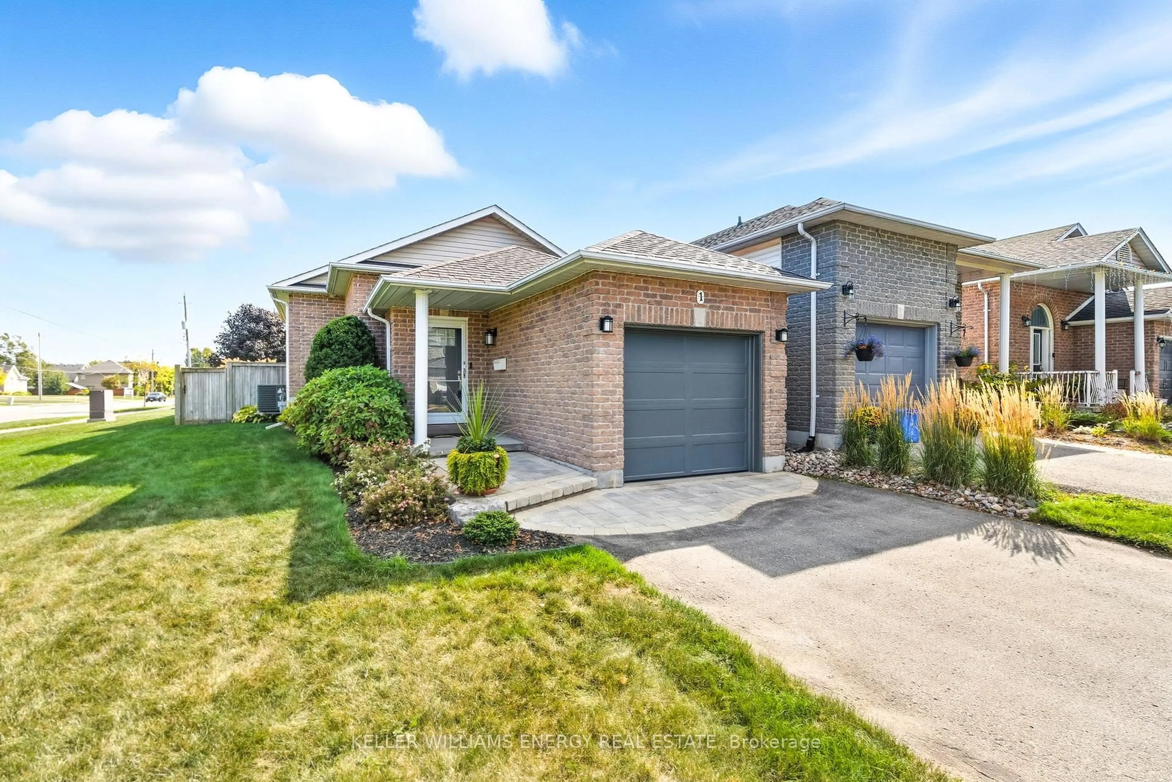 Home with brick exterior material, street for 1 Daiseyfield Ave, Clarington Ontario L1E 3E8