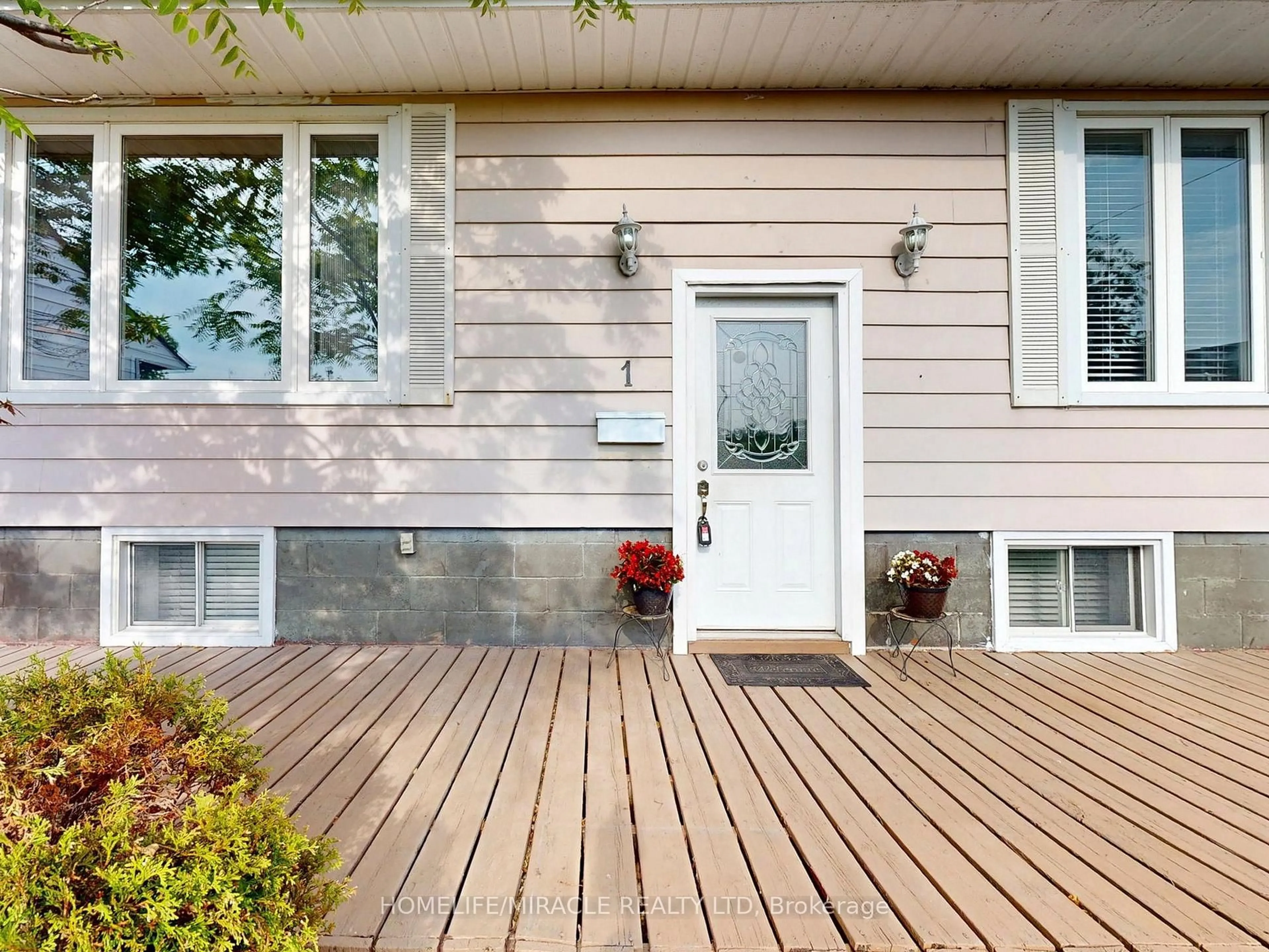 Home with vinyl exterior material, street for 1 Tudor Ave, Ajax Ontario L1S 1Z8