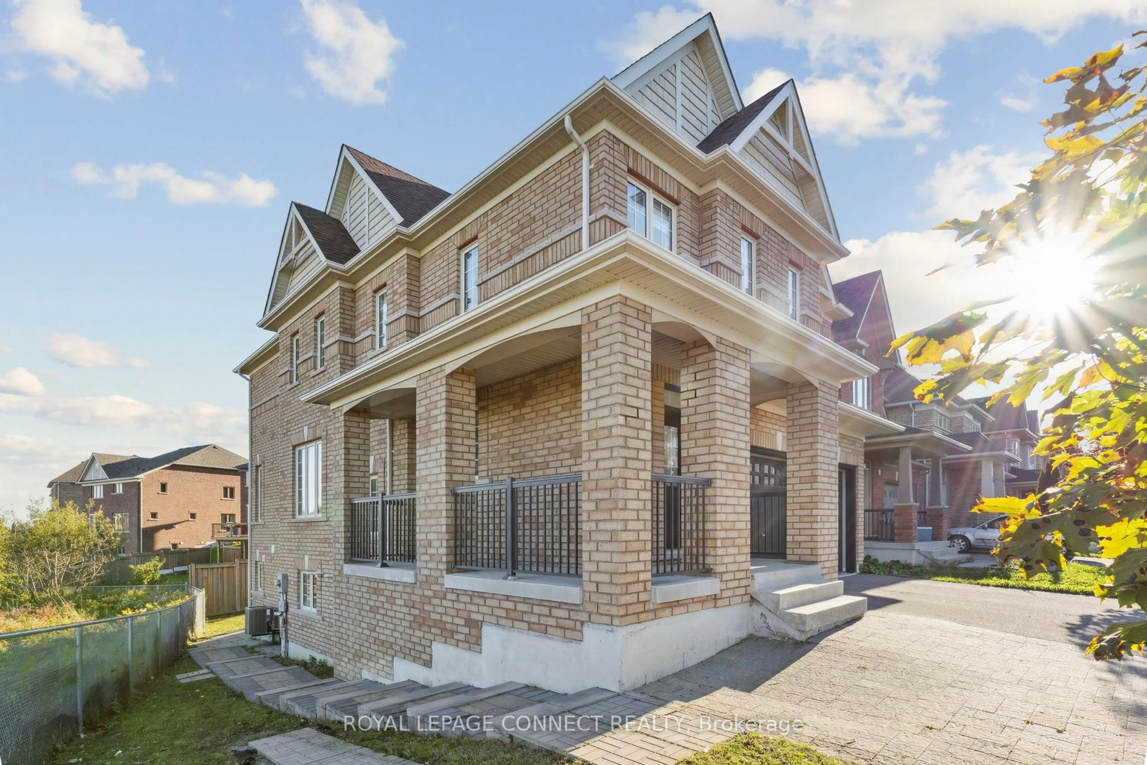 Home with brick exterior material, street for 153 Windfields Farm Dr, Oshawa Ontario L1L 0K2
