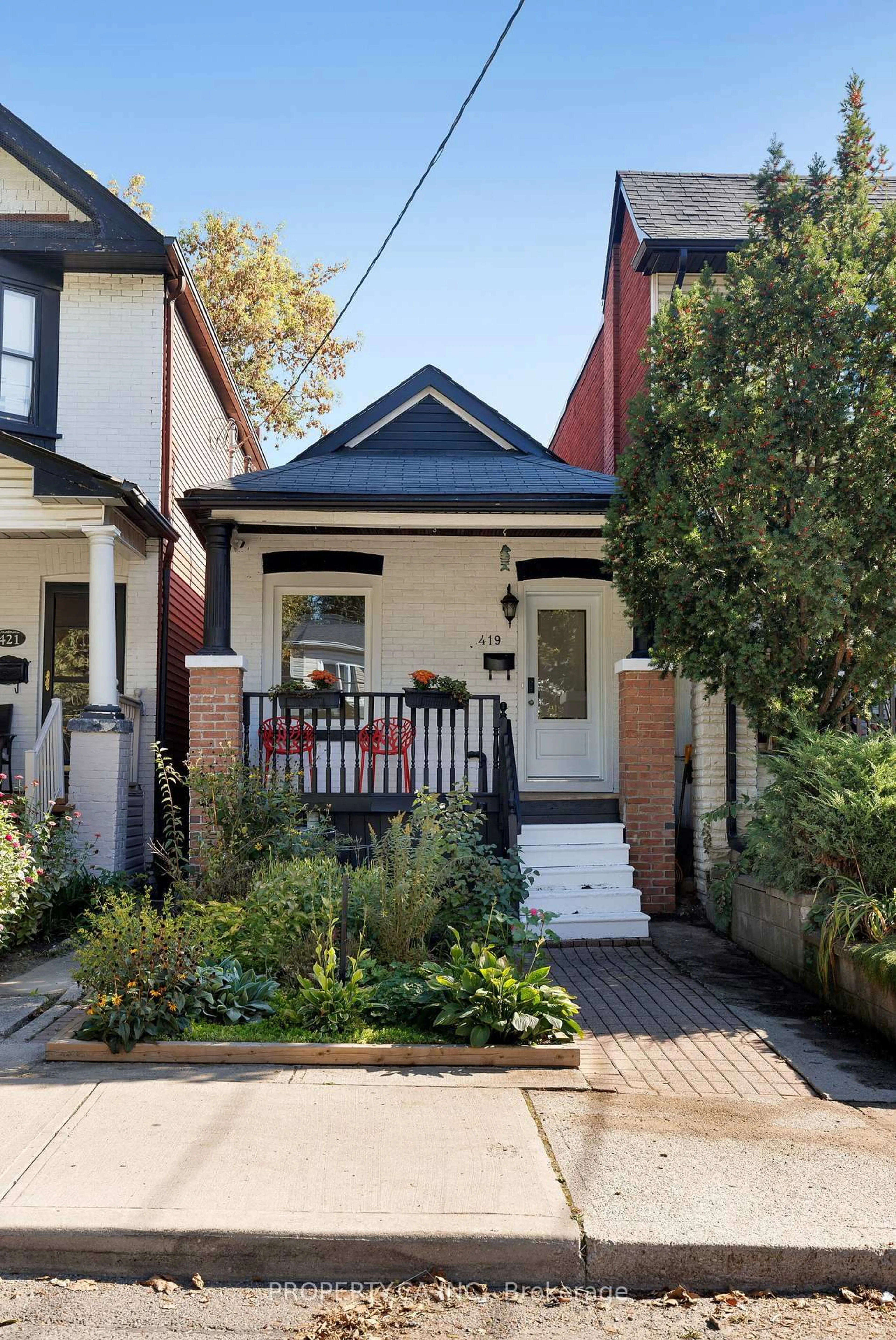 Home with brick exterior material, street for 419 RHODES Ave, Toronto Ontario M4L 3A6