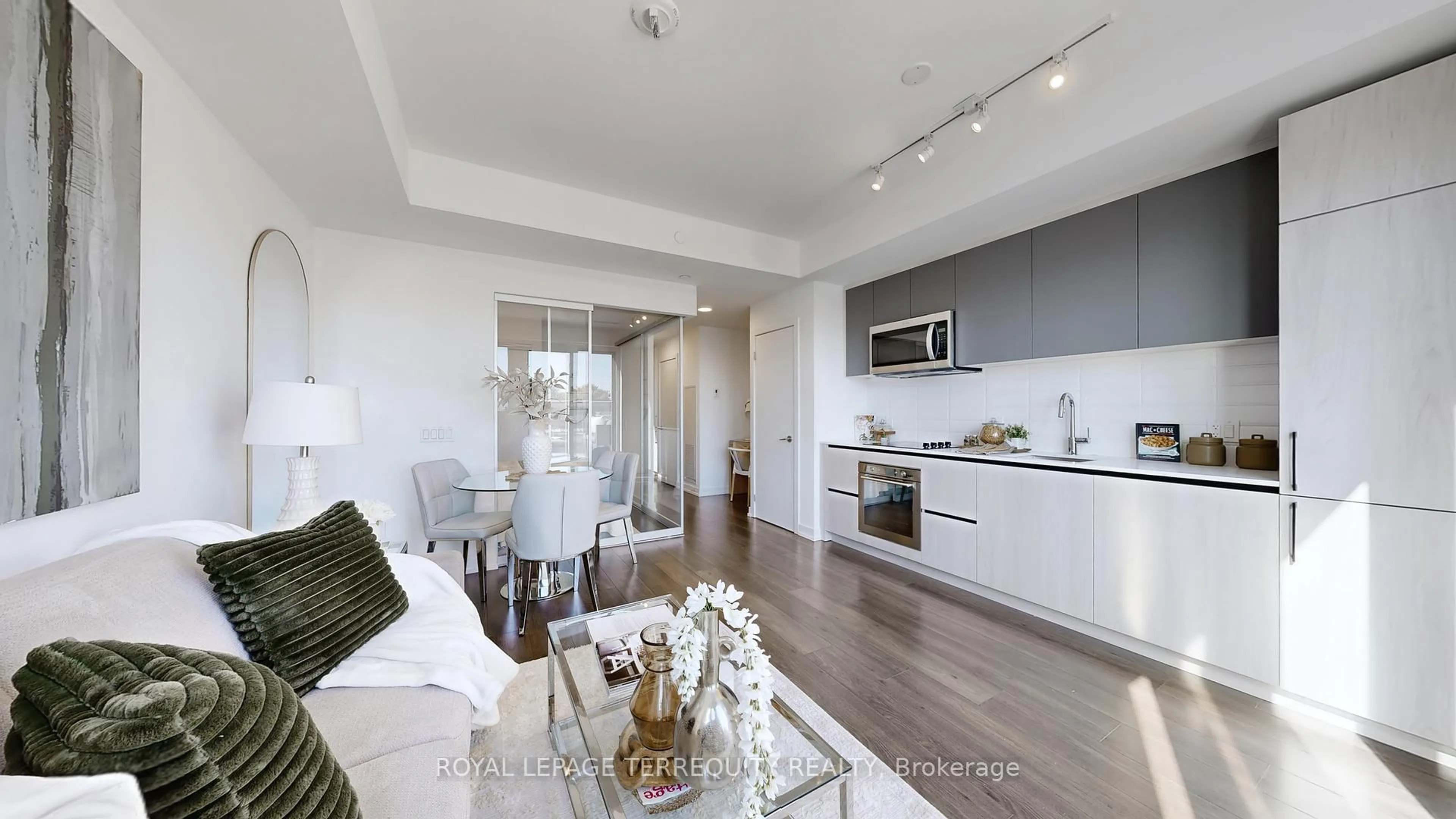 Open concept kitchen, wood/laminate floor for 150 Logan Ave #447, Toronto Ontario M4M 0E4
