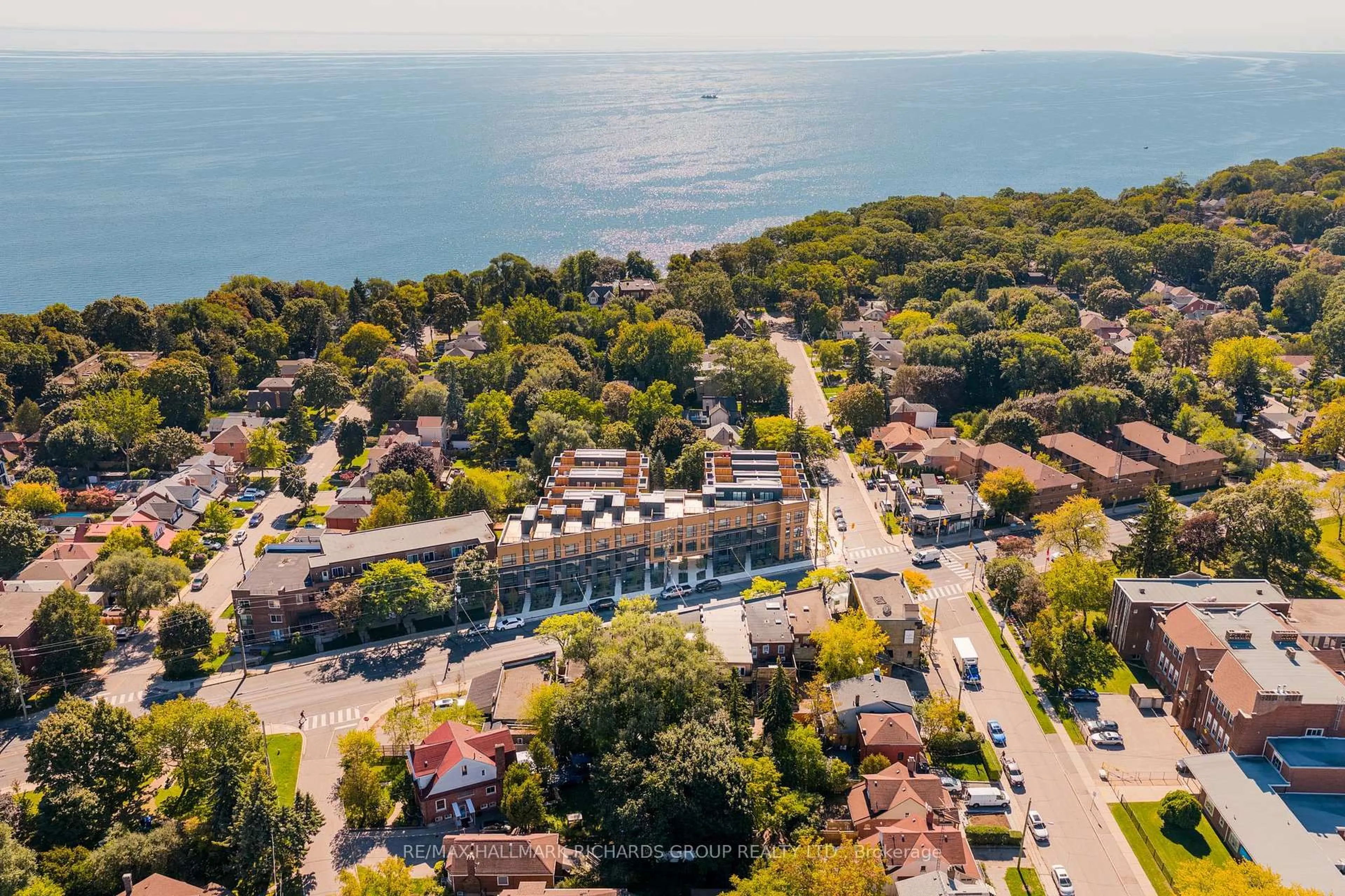 A pic from outside/outdoor area/front of a property/back of a property/a pic from drone, water/lake/river/ocean view for 35 Birchcliff Ave #52, Toronto Ontario M1N 3C5