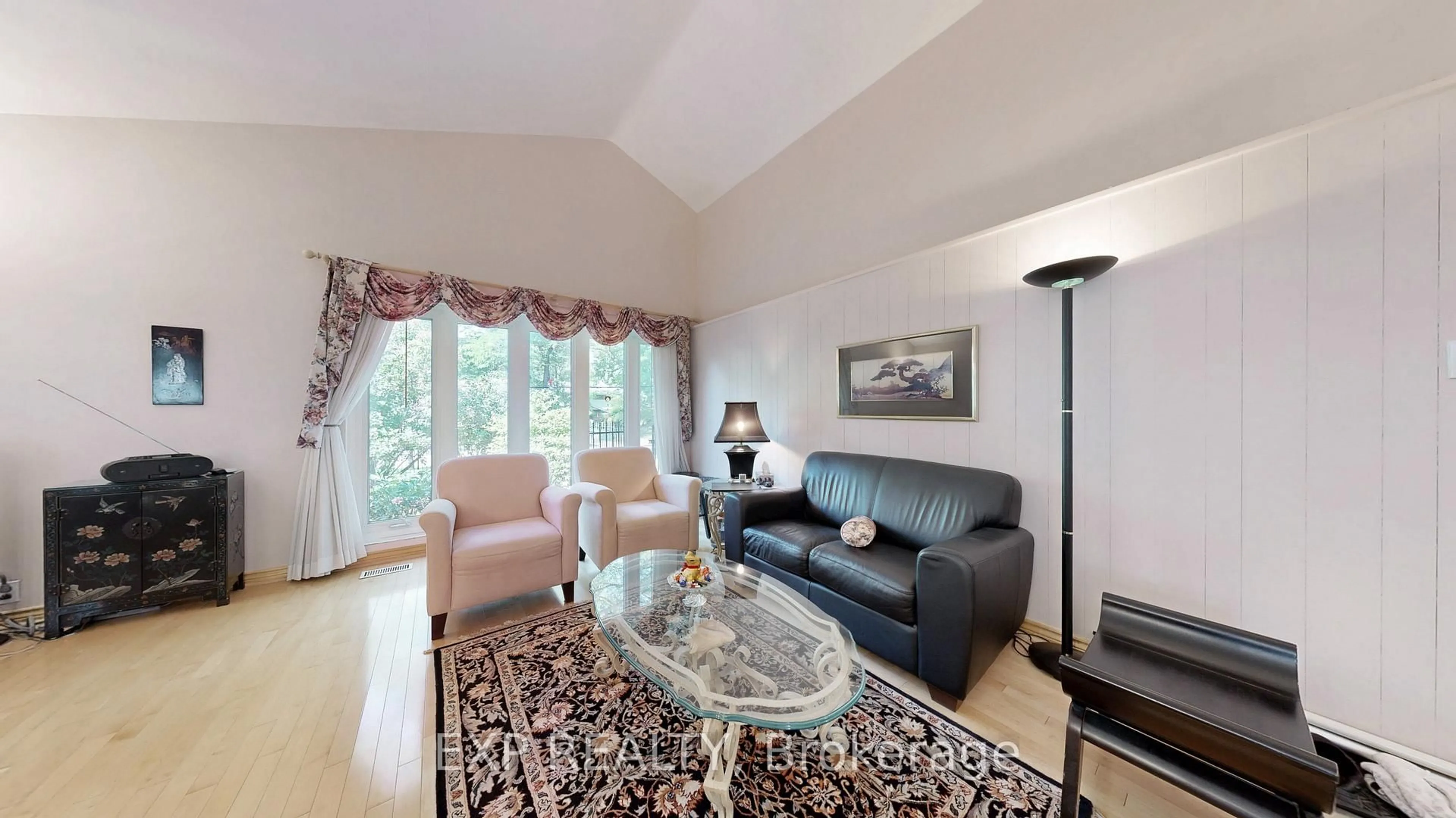 Living room with furniture, wood/laminate floor for 6 Abbottswood Rd, Toronto Ontario M1P 3P1