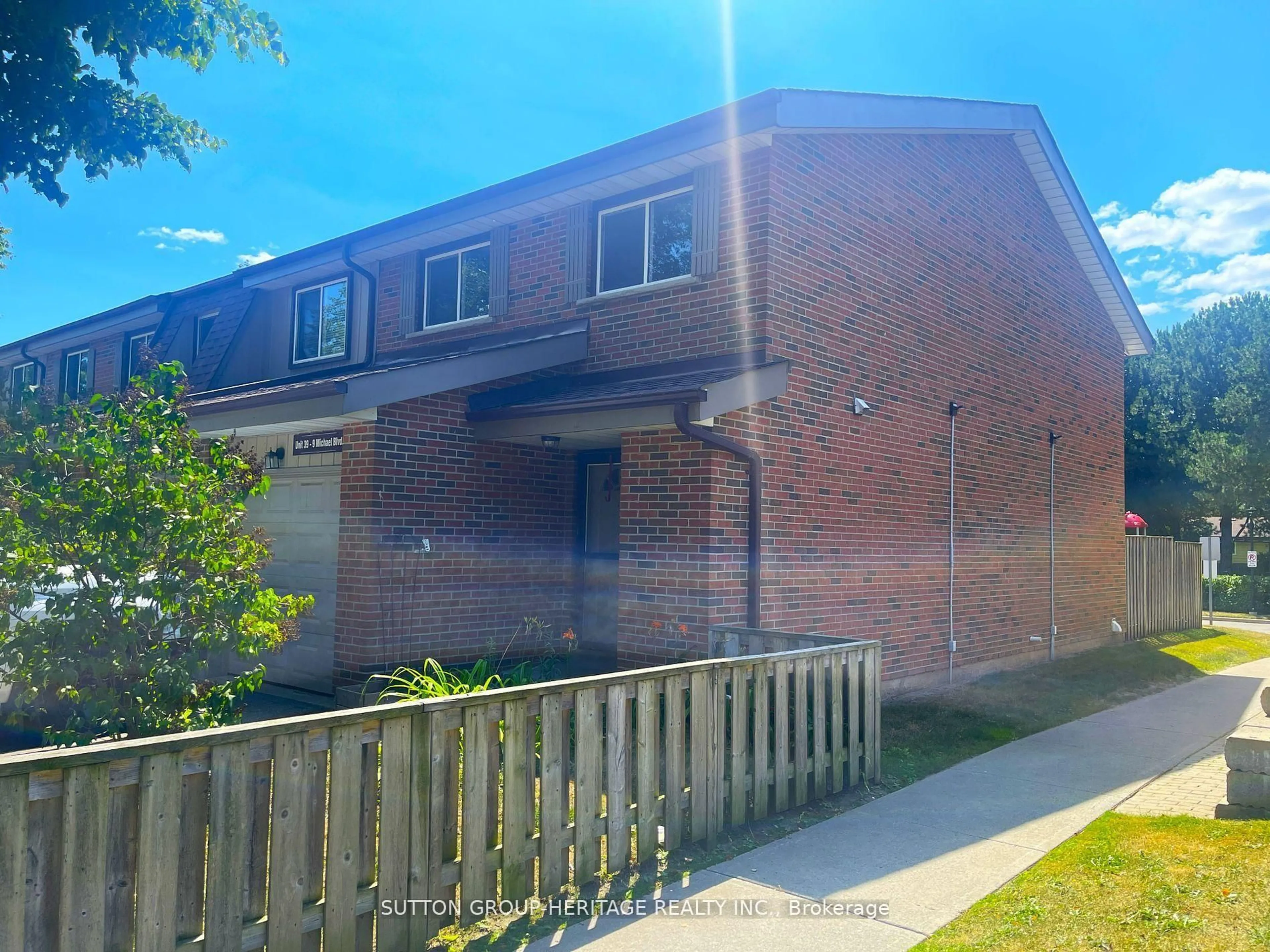Home with brick exterior material, street for 9 Michael Blvd #39, Whitby Ontario L1N 5P4