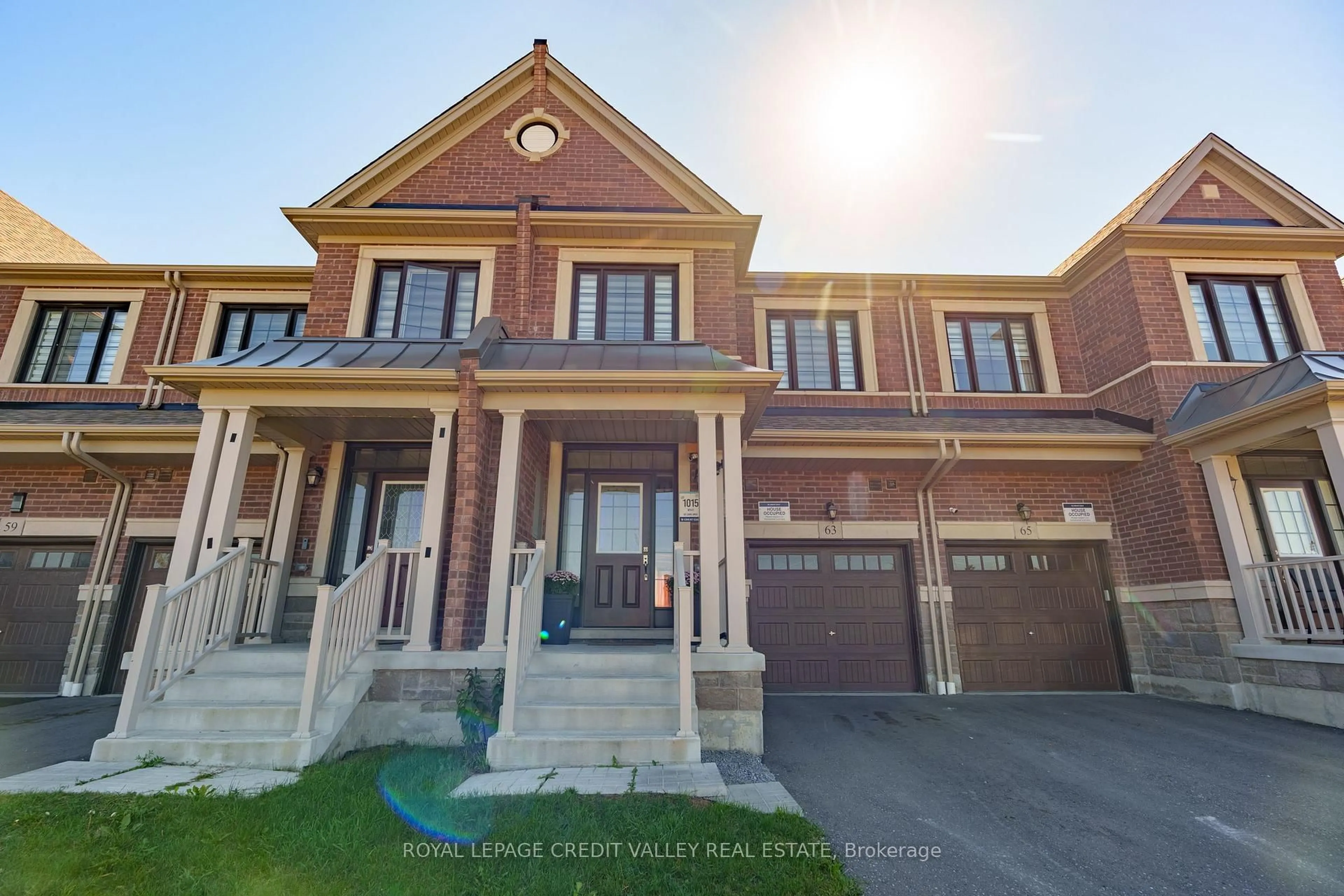 Home with brick exterior material, street for 63 Laing Dr, Whitby Ontario L1P 0N6