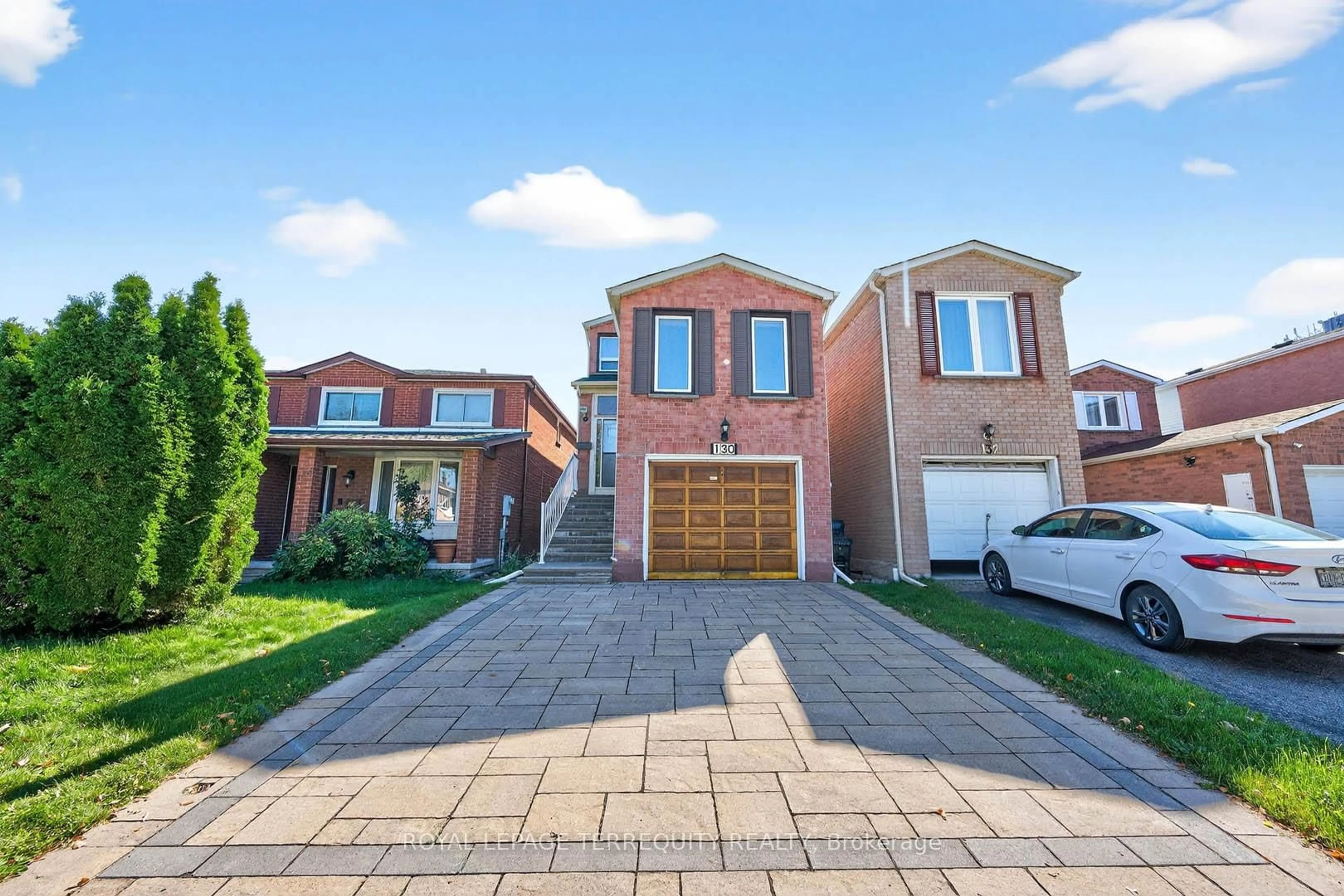 Home with brick exterior material, street for 130 Whistling Hills Dr, Toronto Ontario M1V 3L1