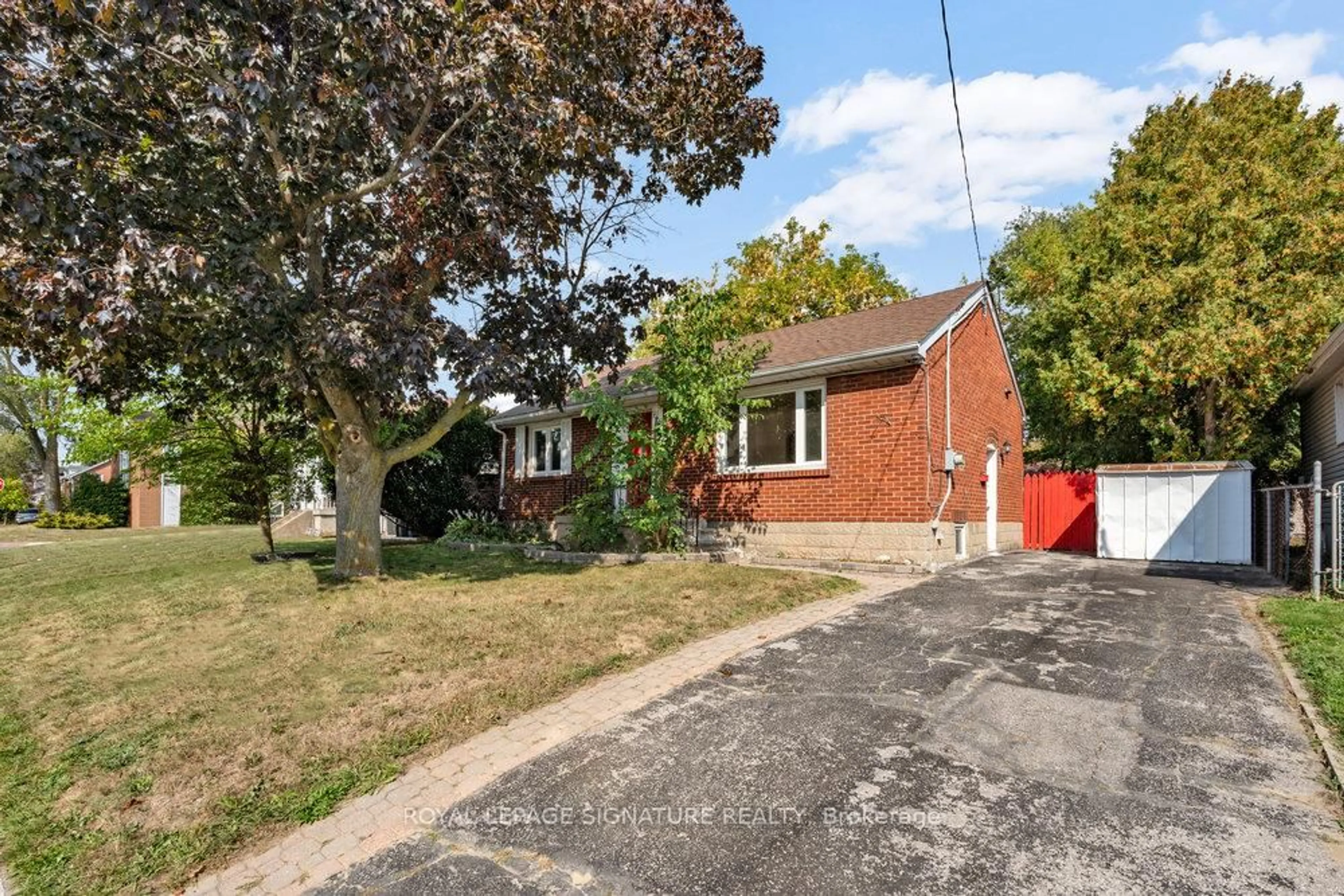 Home with brick exterior material, street for 75 Westbourne Ave, Toronto Ontario M1L 2Y3