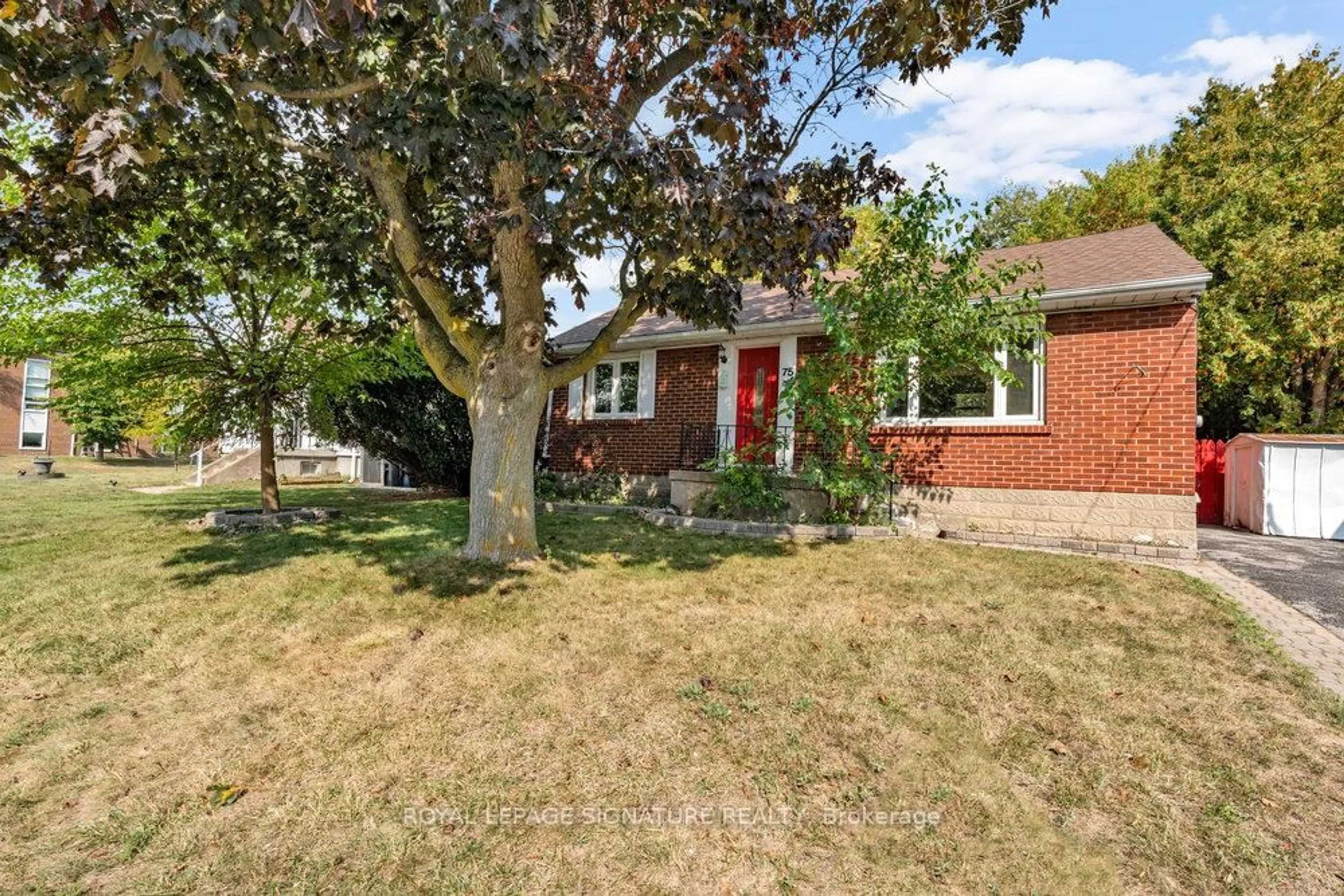Home with brick exterior material, street for 75 Westbourne Ave, Toronto Ontario M1L 2Y3