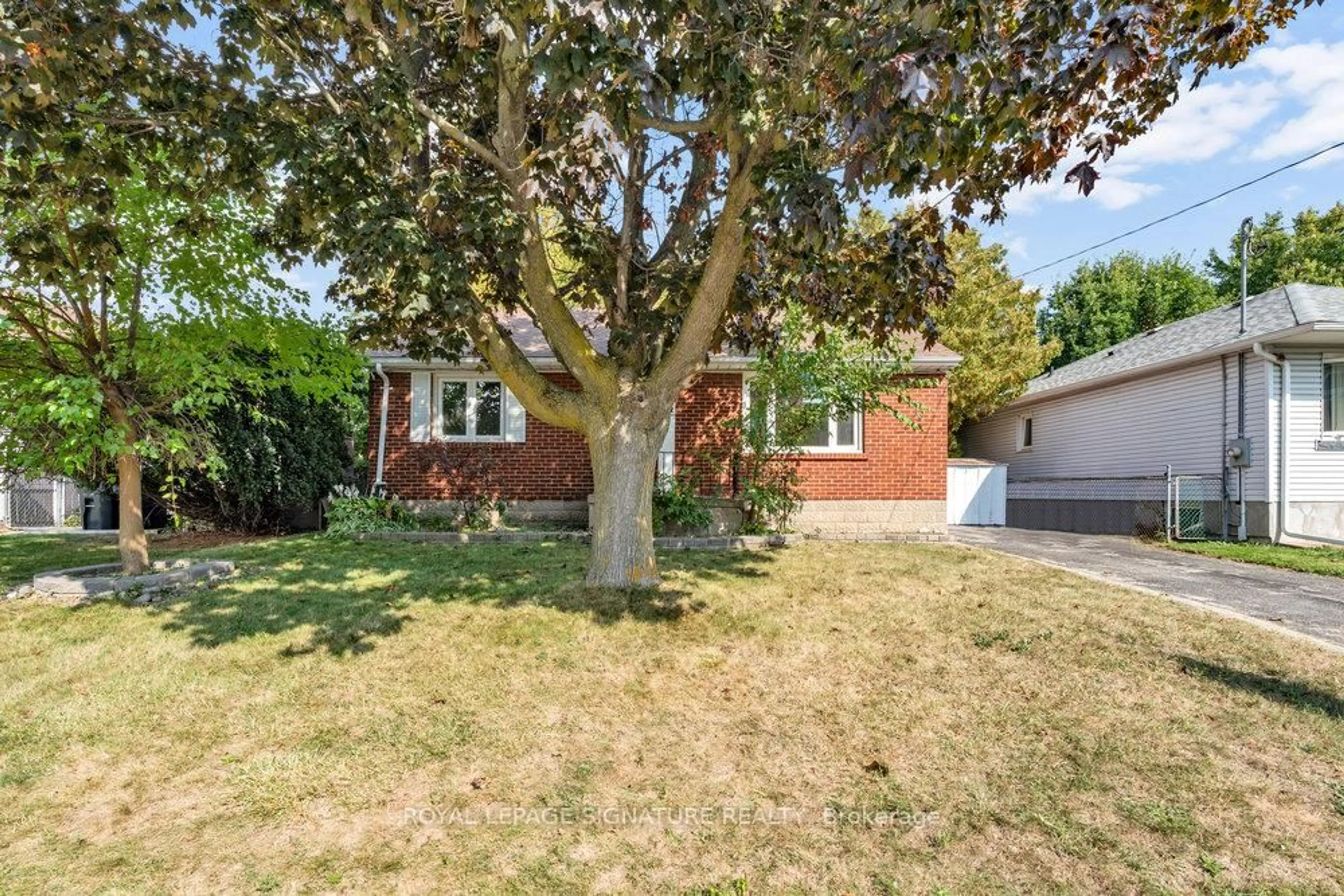 Home with brick exterior material, street for 75 Westbourne Ave, Toronto Ontario M1L 2Y3