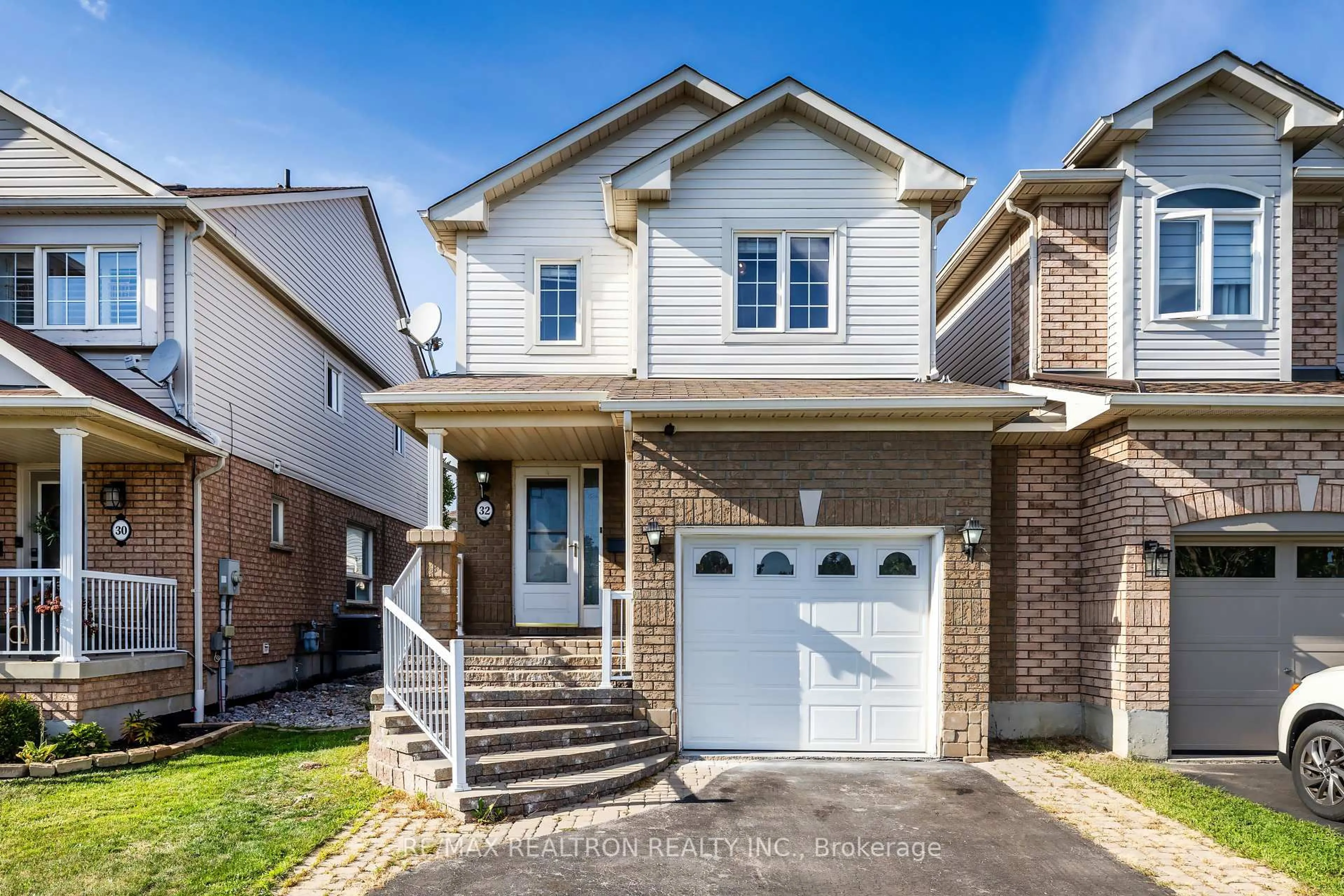 Home with brick exterior material, street for 32 Samandria Ave, Whitby Ontario L1R 2Z7