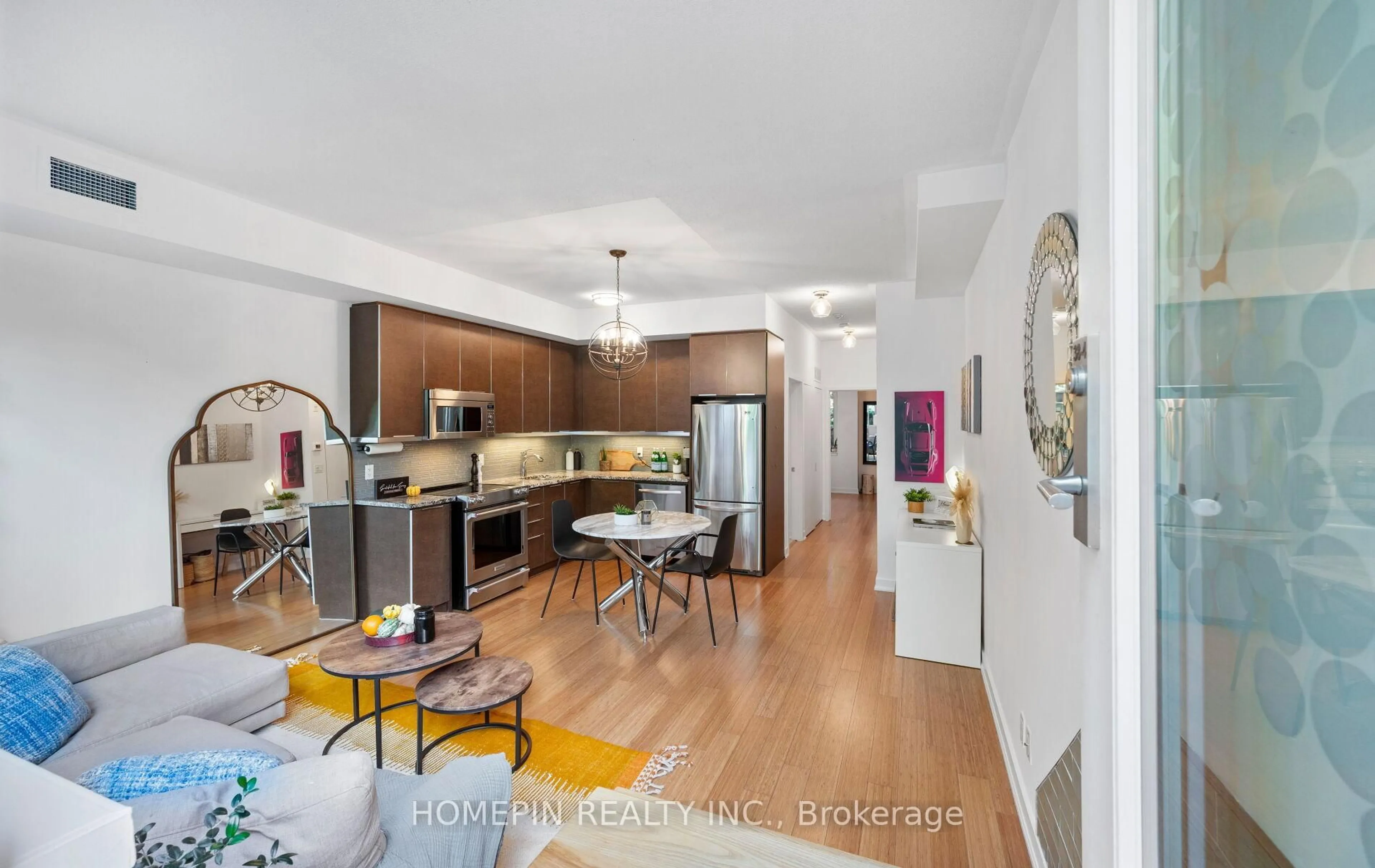 Open concept kitchen, wood/laminate floor for 38 Boston Ave #4, Toronto Ontario M4M 2T9
