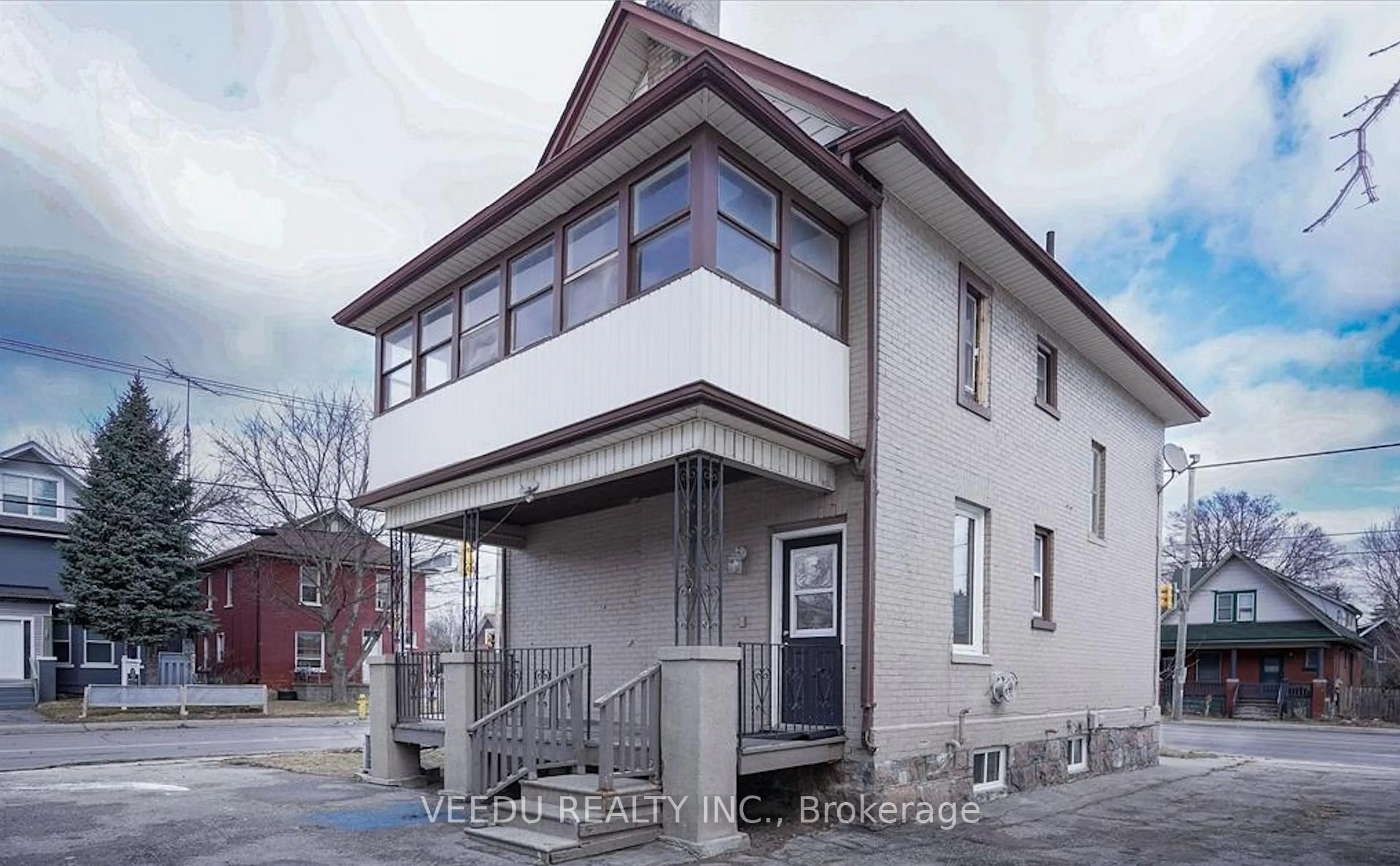 Home with brick exterior material, street for 42 Ritson Rd, Oshawa Ontario L1H 5G9