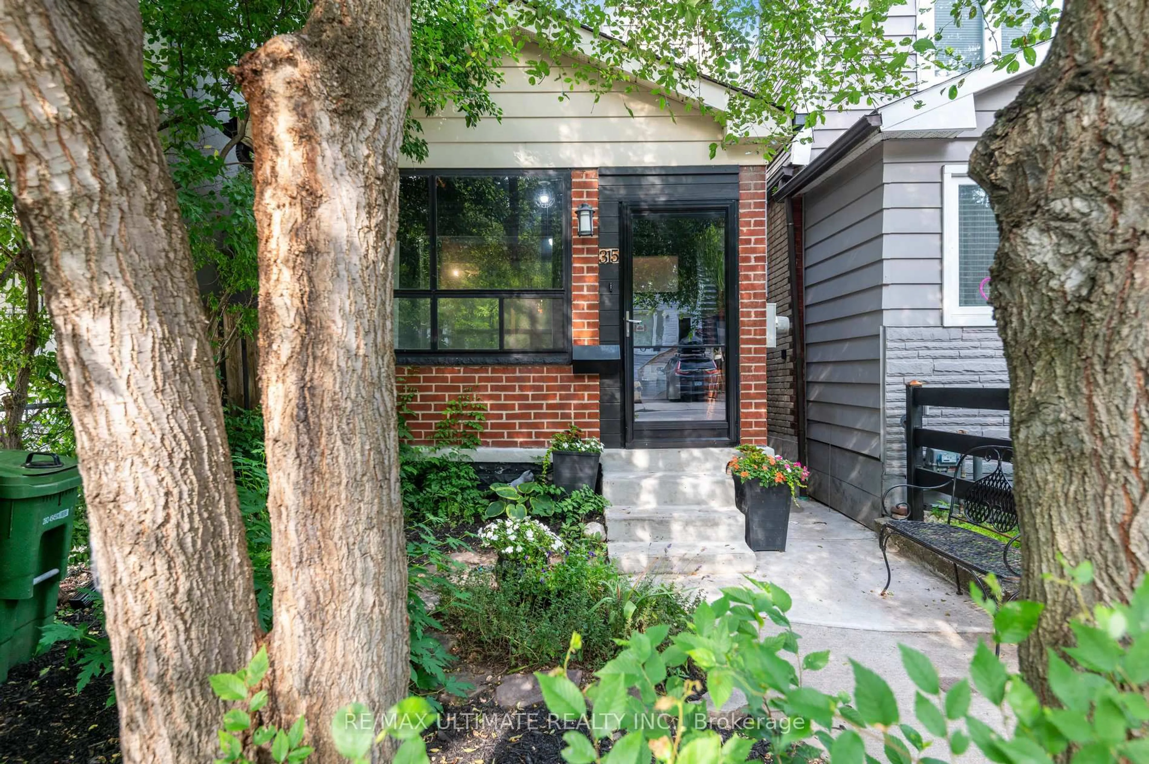 Home with brick exterior material, street for 315 Cedarvale Ave, Toronto Ontario M4C 4K3