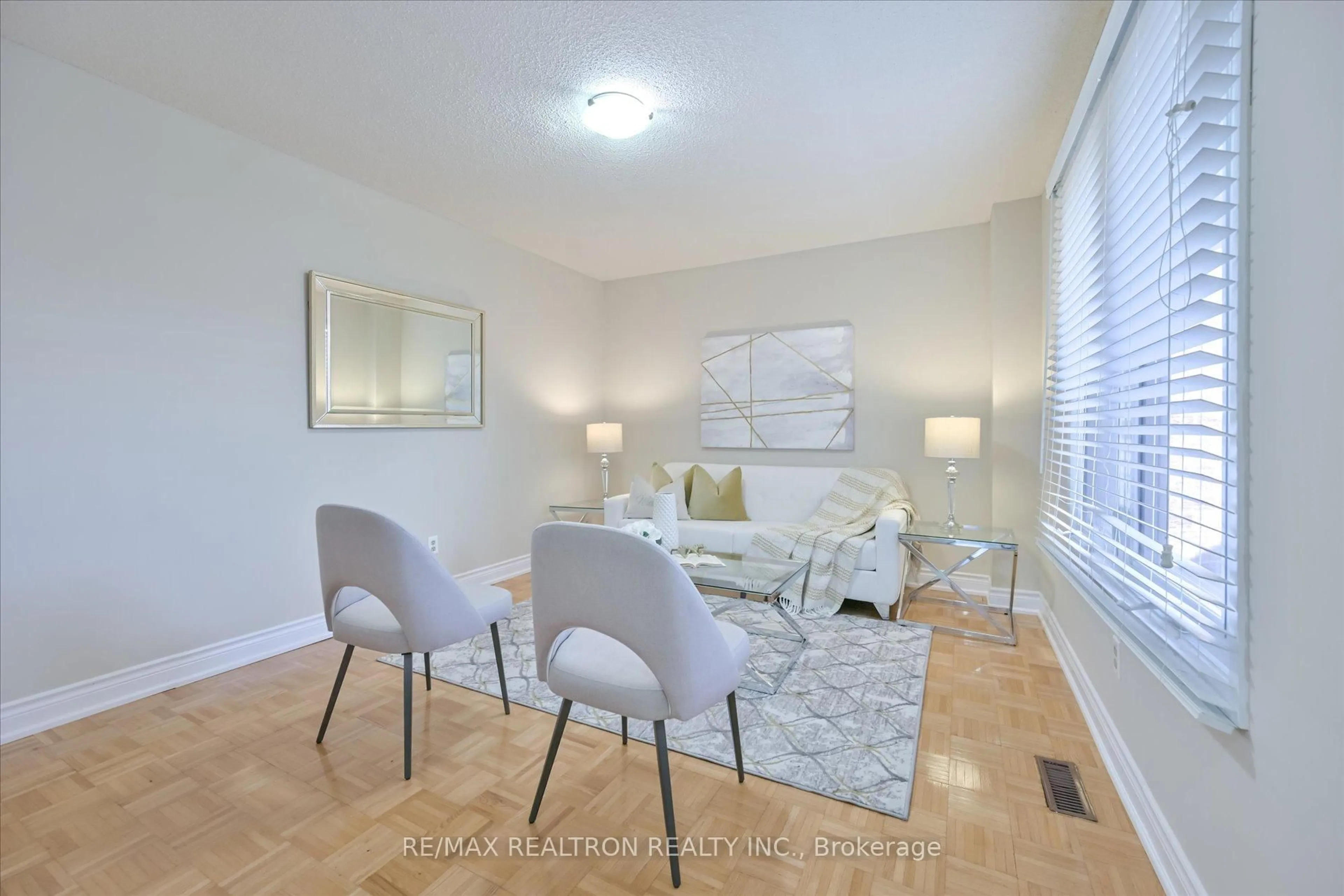 Living room with furniture, wood/laminate floor for 203 Glen Hill Dr, Whitby Ontario L1N 7J5