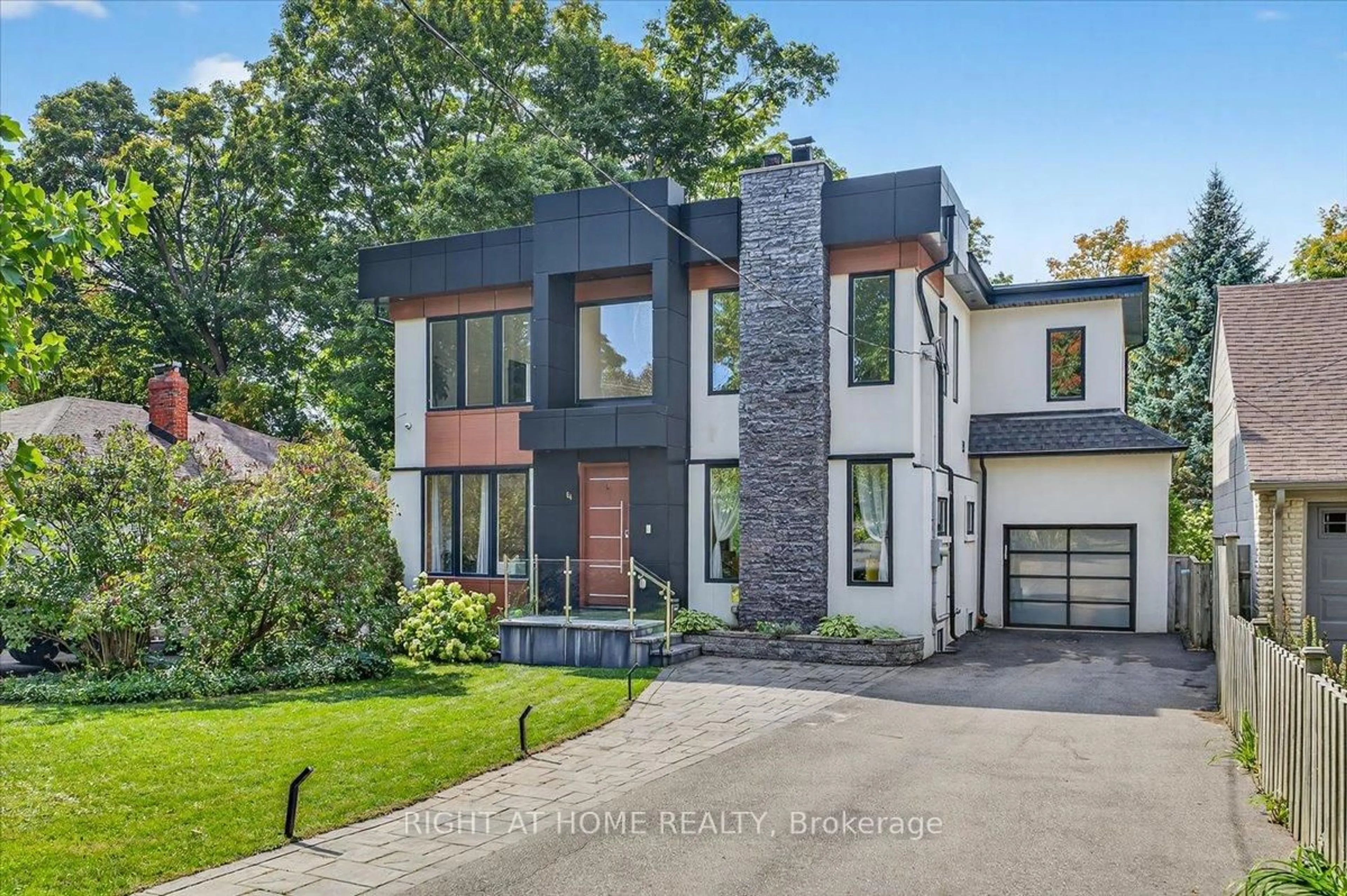 Home with brick exterior material, street for 64 Larwood Blvd, Toronto Ontario M1M 2M5