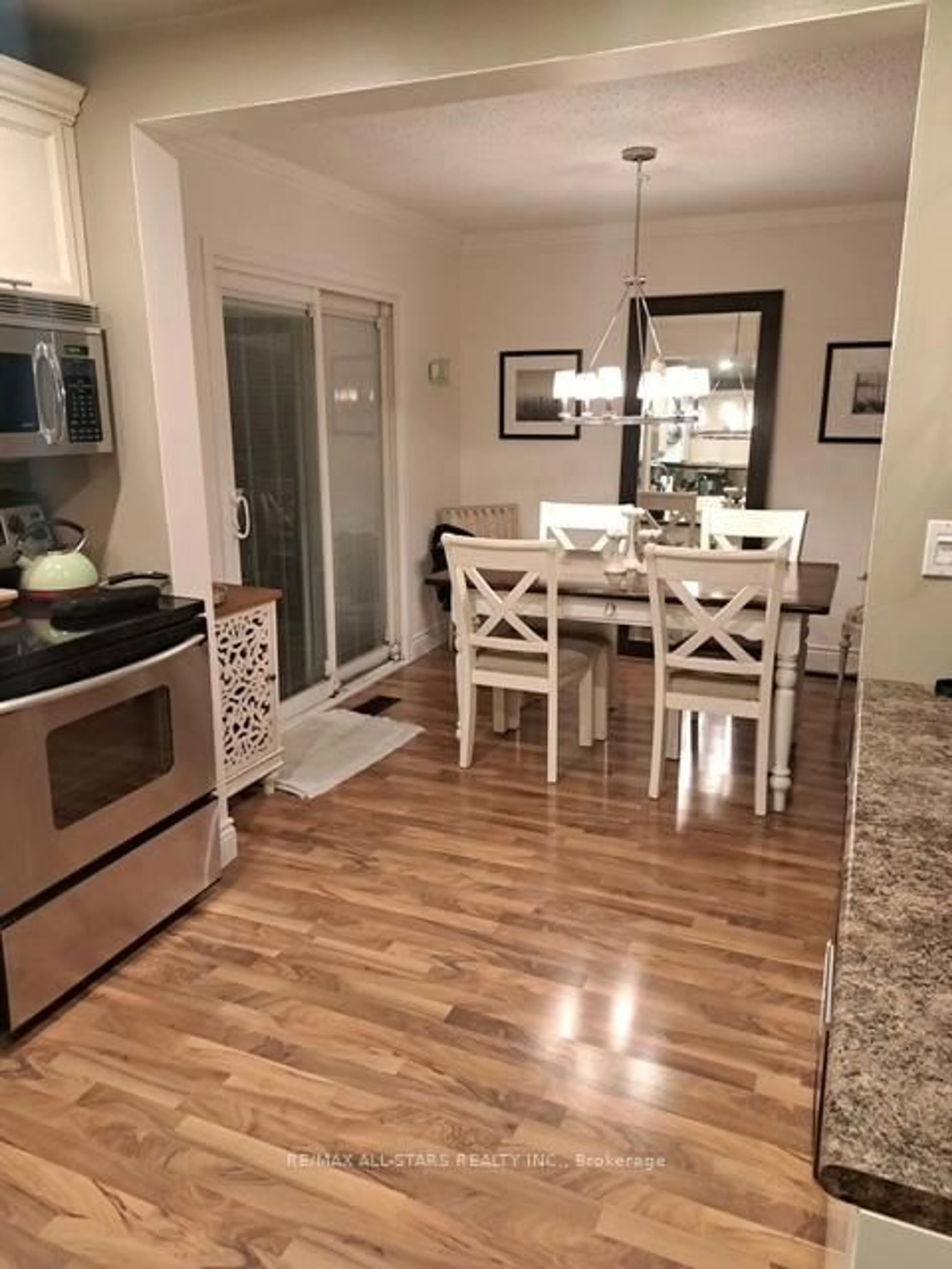 Open concept kitchen, wood/laminate floor for 689 Foxwood Tr, Pickering Ontario L1V 3Y1