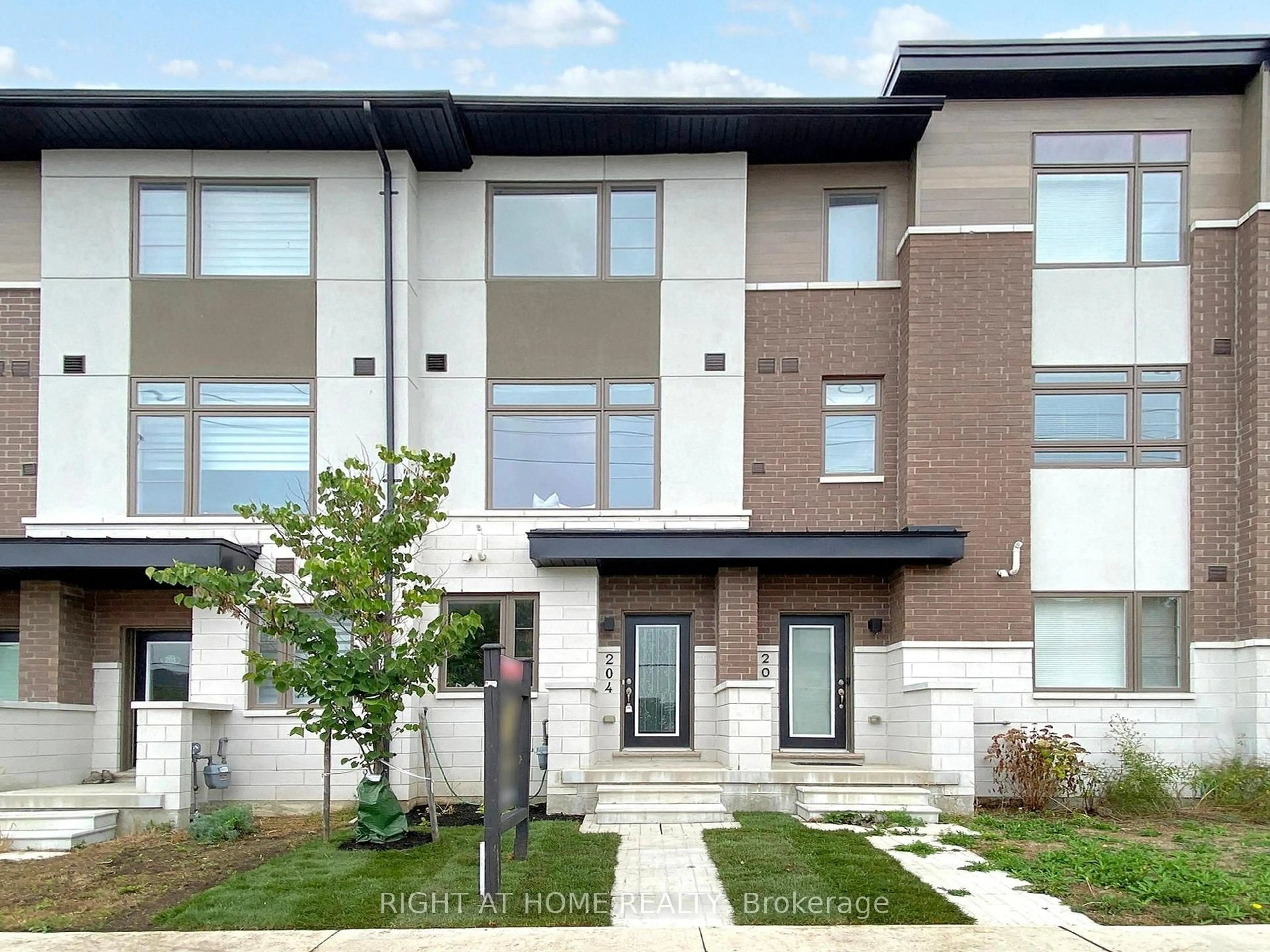 Home with brick exterior material, street for 250 Finch Ave #204, Pickering Ontario L1V 0G6