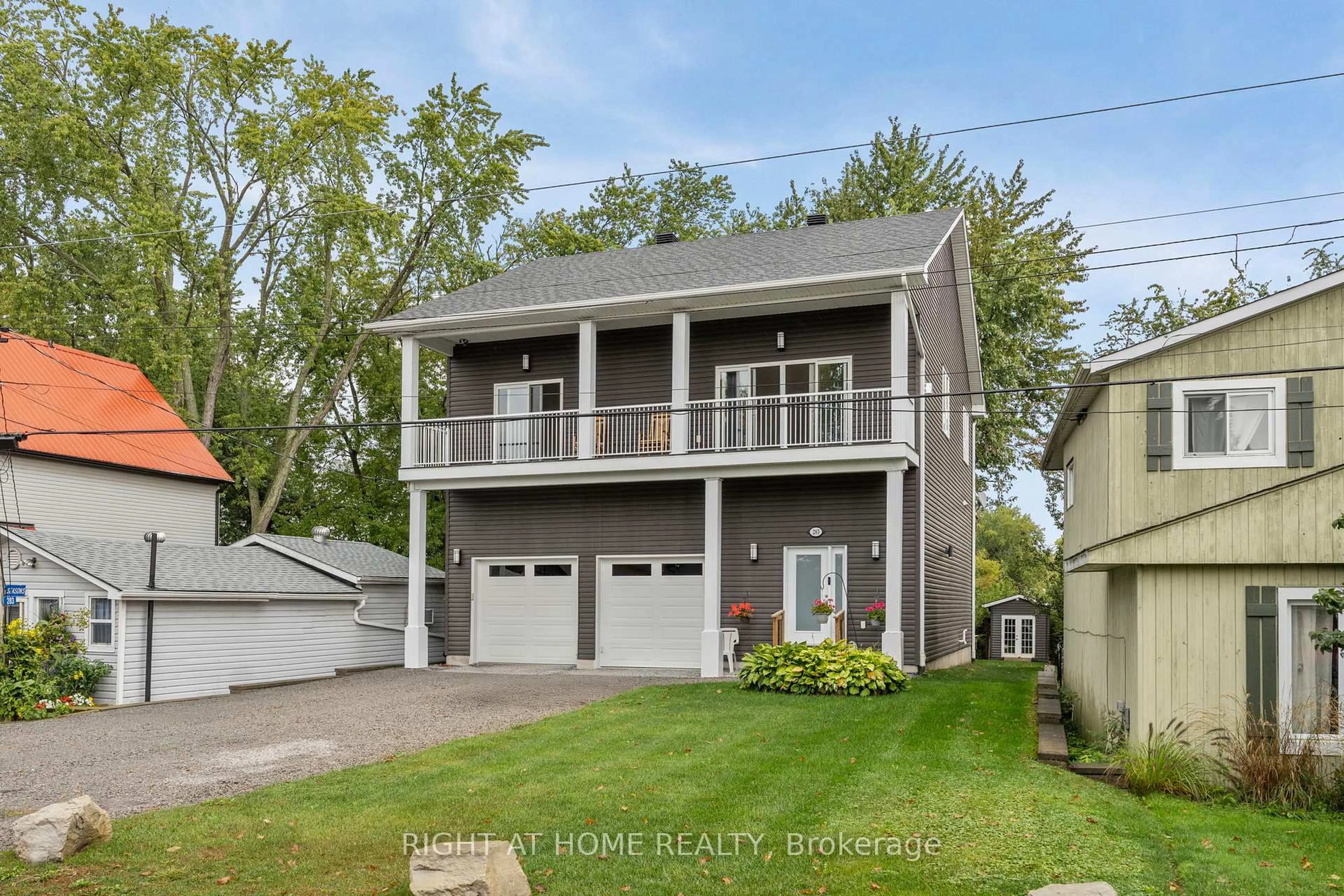Home with vinyl exterior material, street for 283 Platten Blvd, Scugog Ontario L9L 1B4