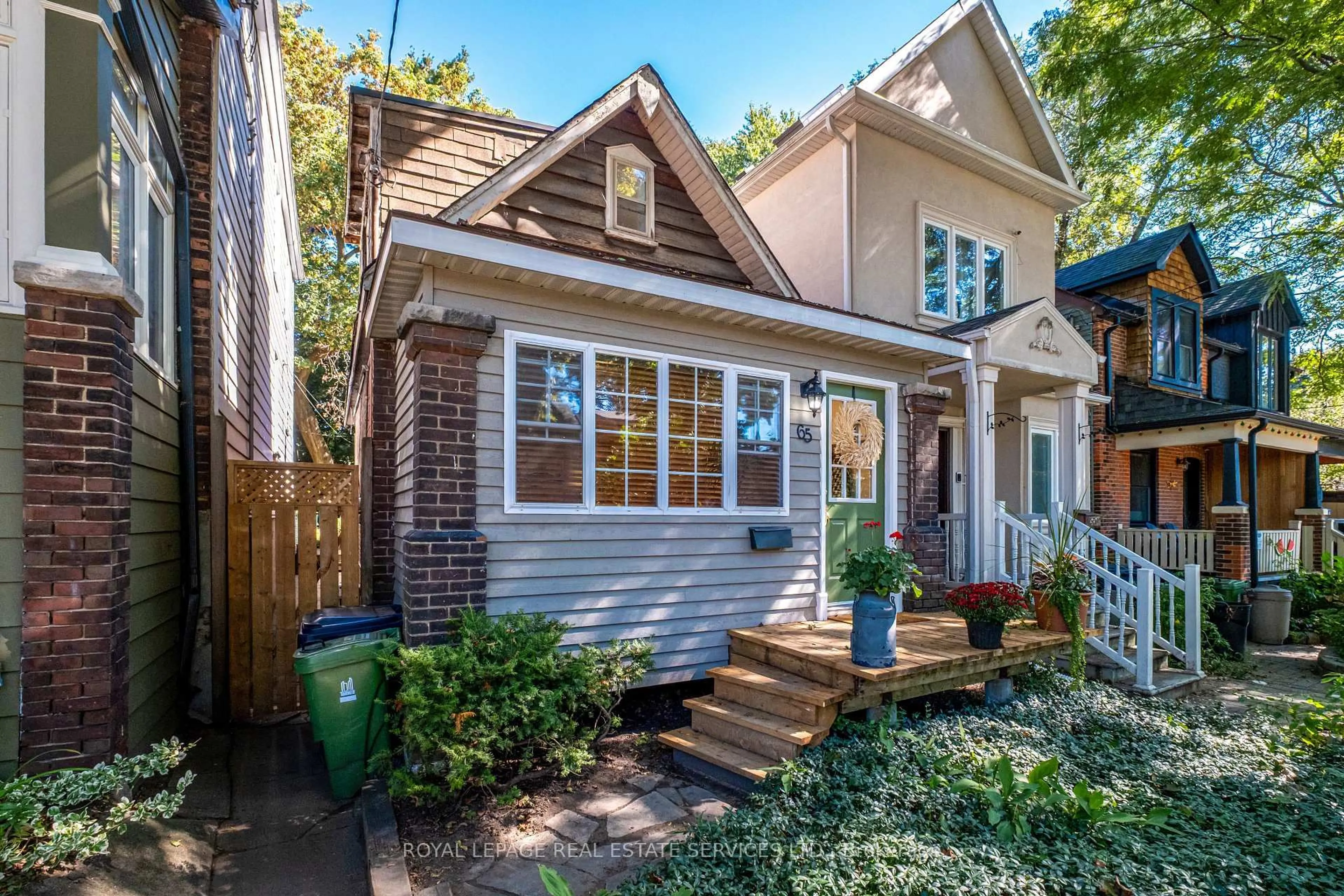 Home with brick exterior material, street for 65 Drayton Ave, Toronto Ontario M4C 3L8