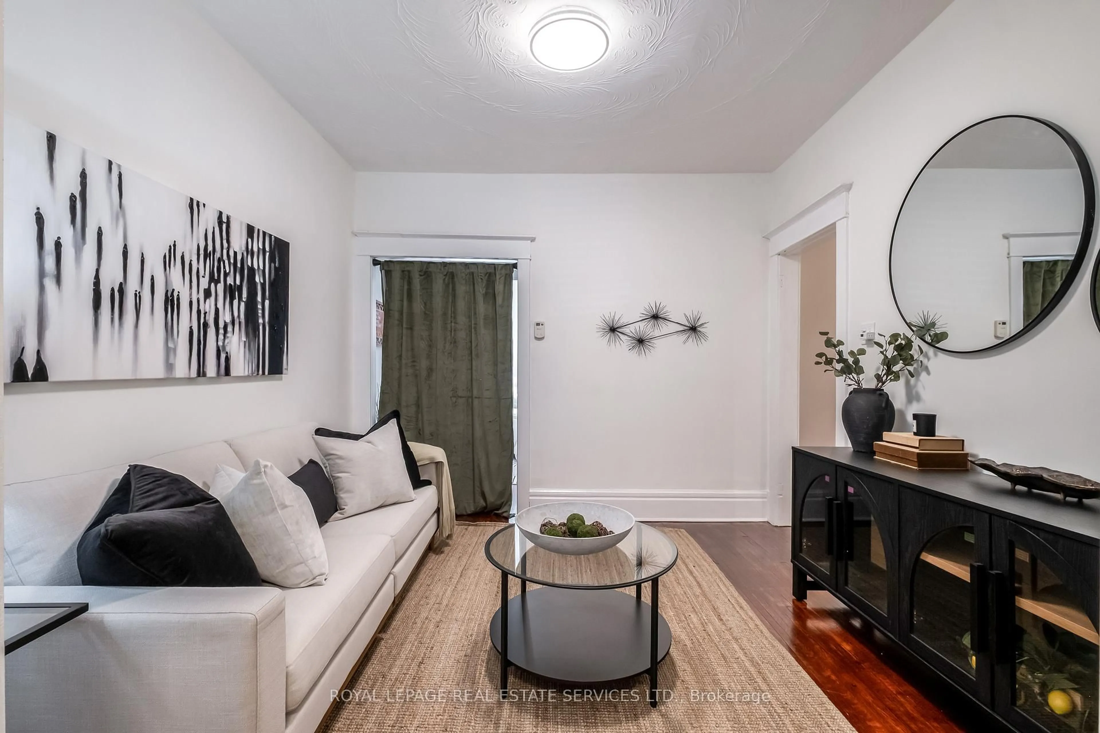 Living room with furniture, unknown for 65 Drayton Ave, Toronto Ontario M4C 3L8