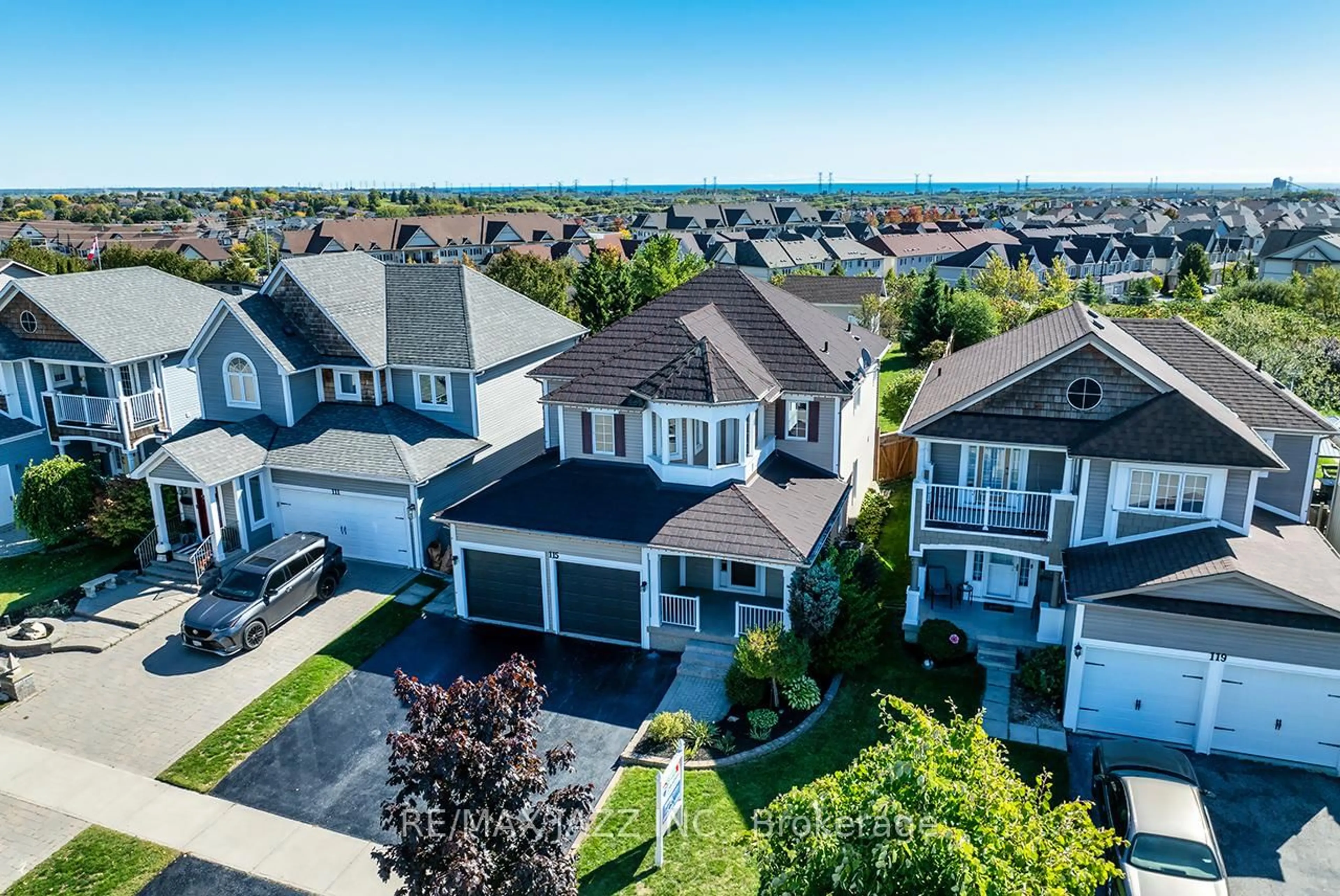 A pic from outside/outdoor area/front of a property/back of a property/a pic from drone, unknown for 115 Padfield Dr, Clarington Ontario L1C 5H6