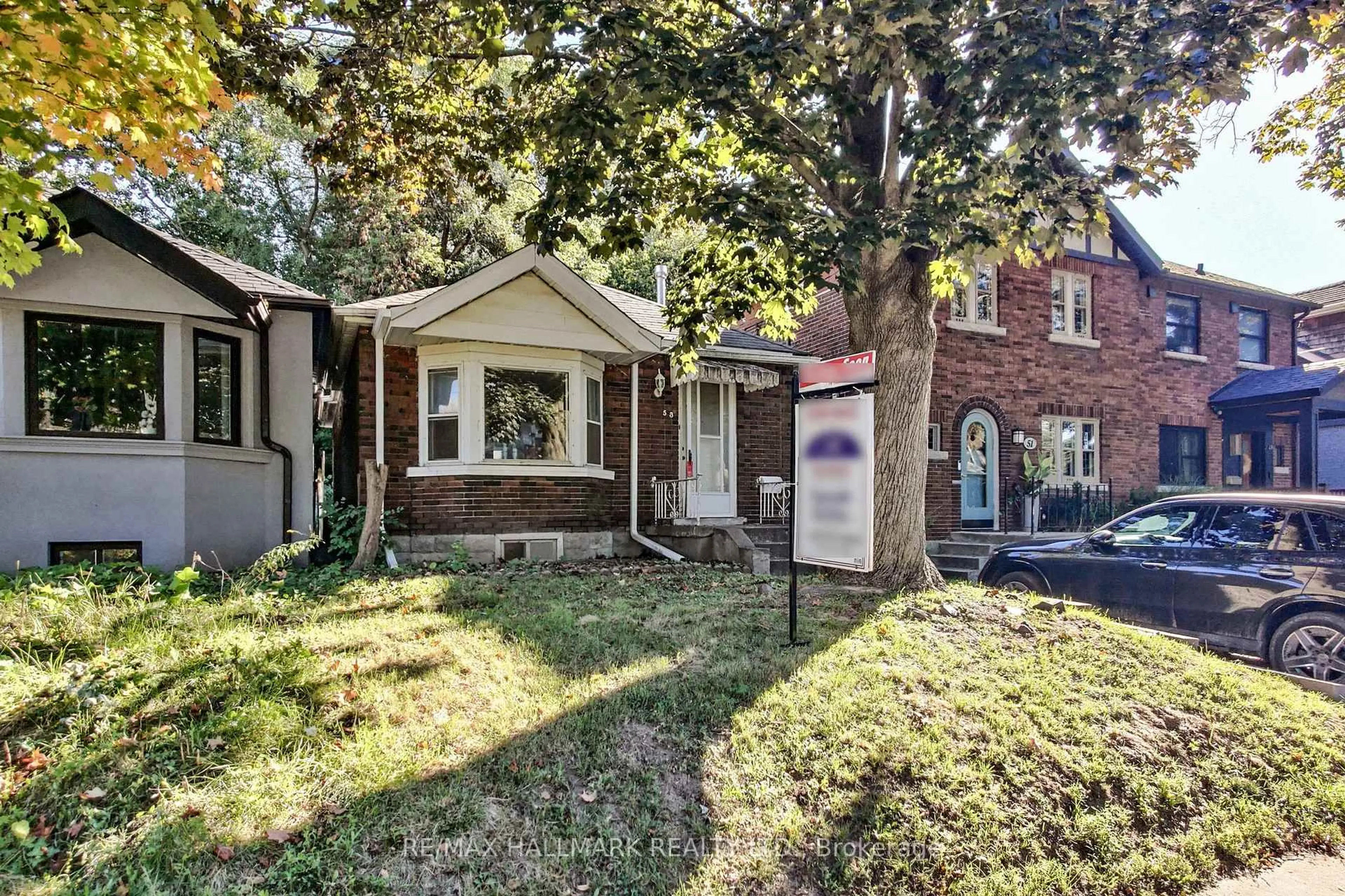 Home with brick exterior material, street for 53 Highfield Rd, Toronto Ontario M4L 2T9