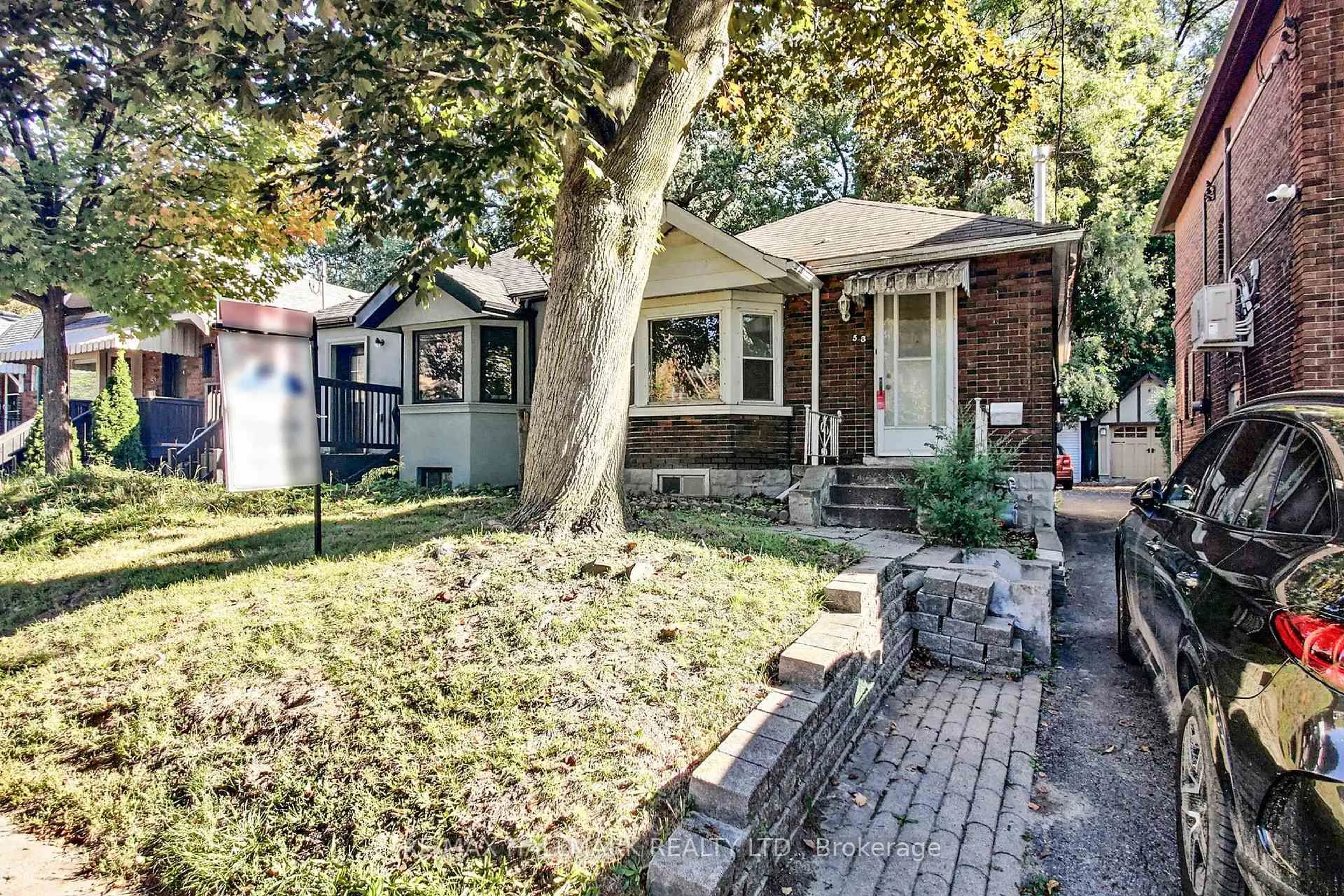 Home with brick exterior material, street for 53 Highfield Rd, Toronto Ontario M4L 2T9